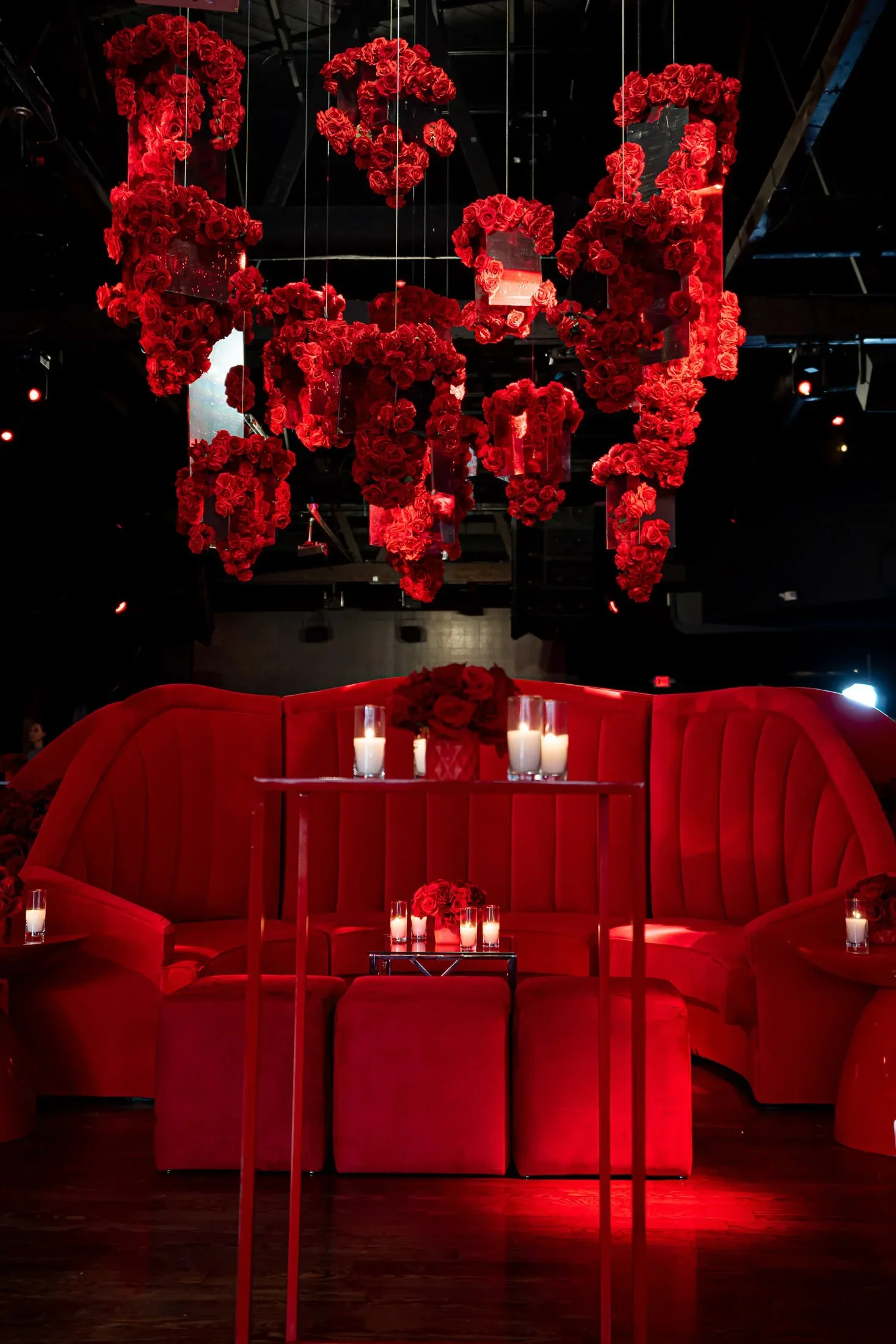 Bar Mitzvah Event Planning in Los Angeles with Red Floral Installations and a Luxury Event Setting
