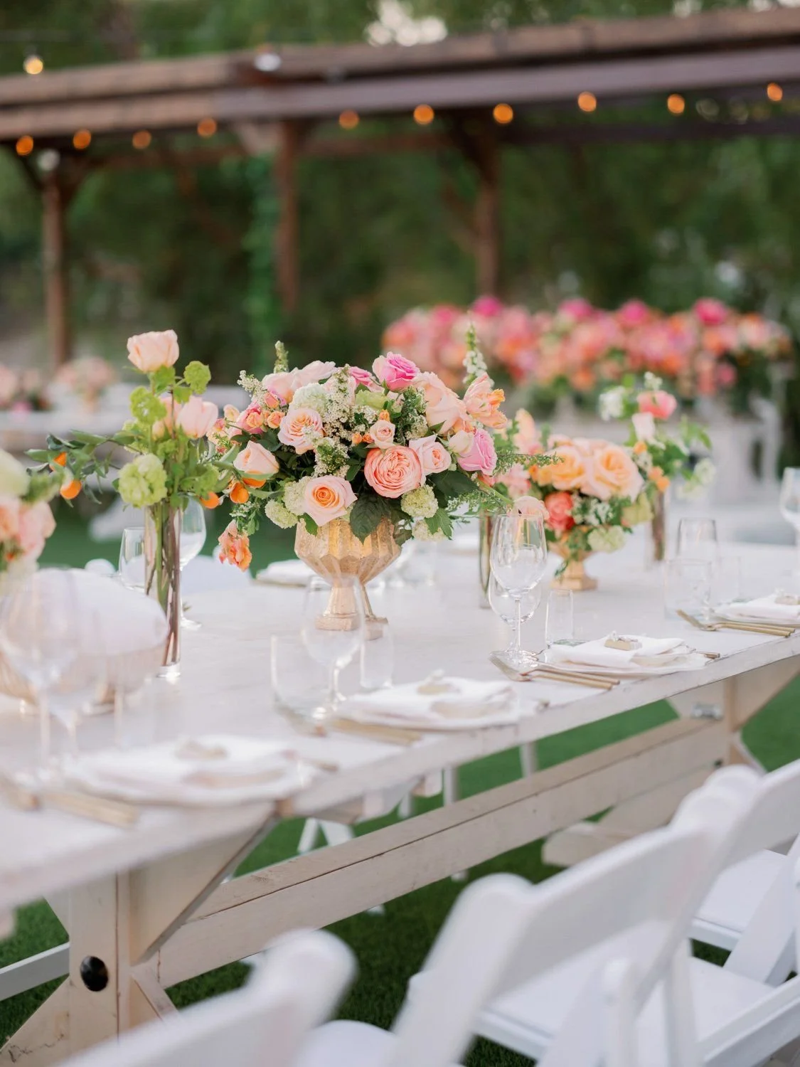 Wedding Planner Styling Outdoor Wedding Details with Coordinated Invitations and Florals