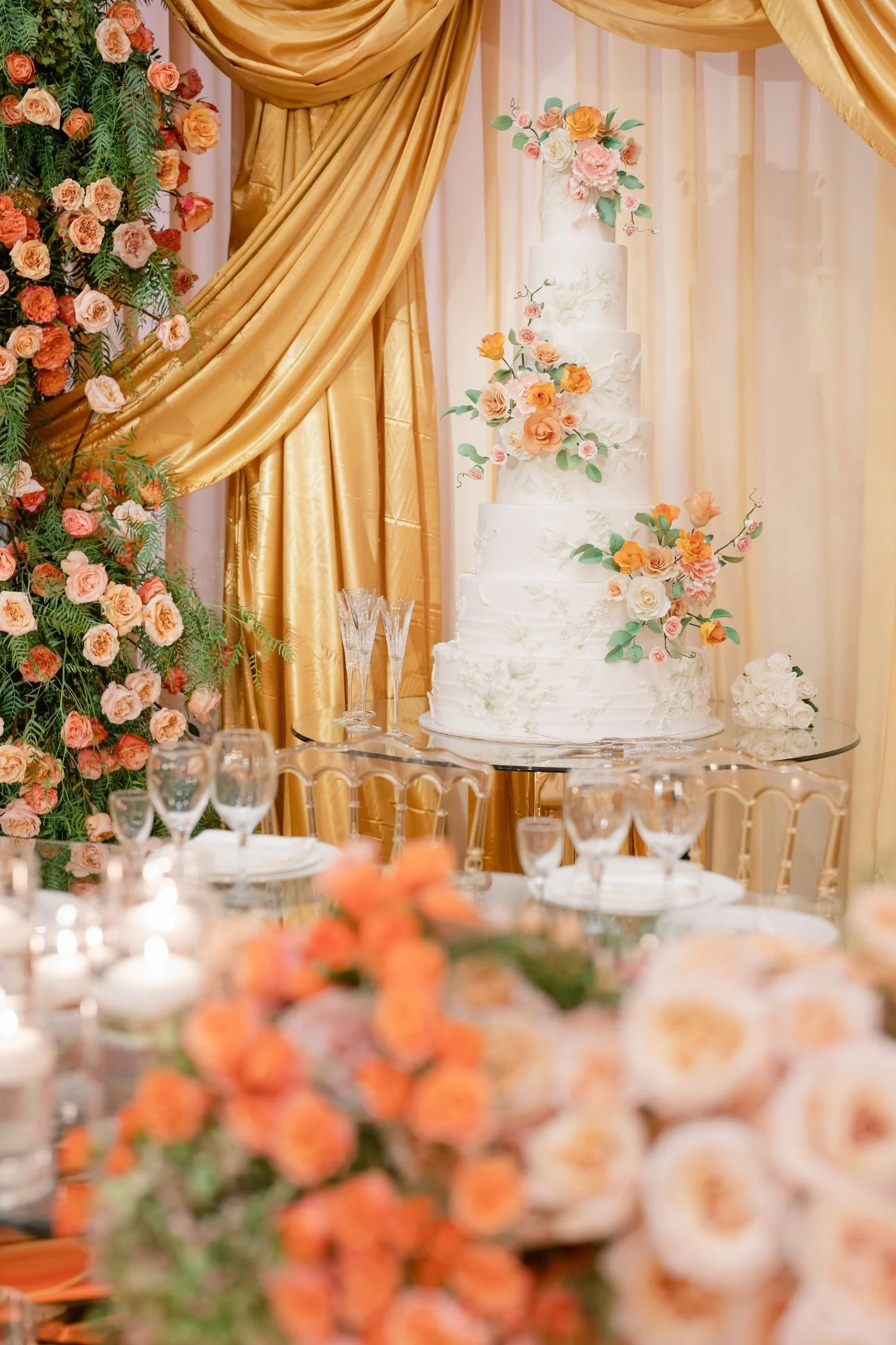 Luxury Wedding Planner Styling an Indoor Garden-Inspired Wedding with Warm Citrus Tones