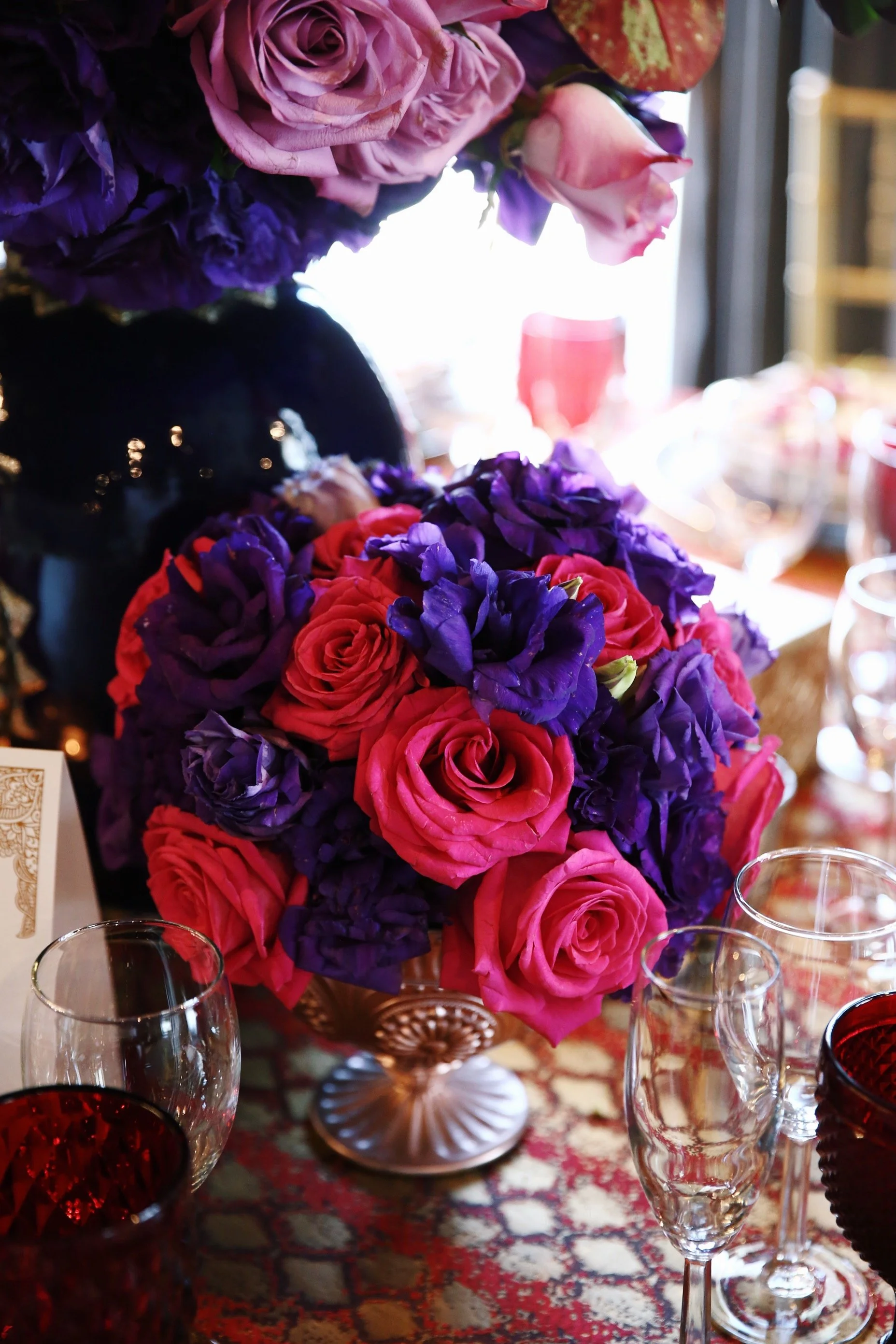 Event Designer Creating a Refined Social Event Atmosphere - Display of Custom Floral Arrangements