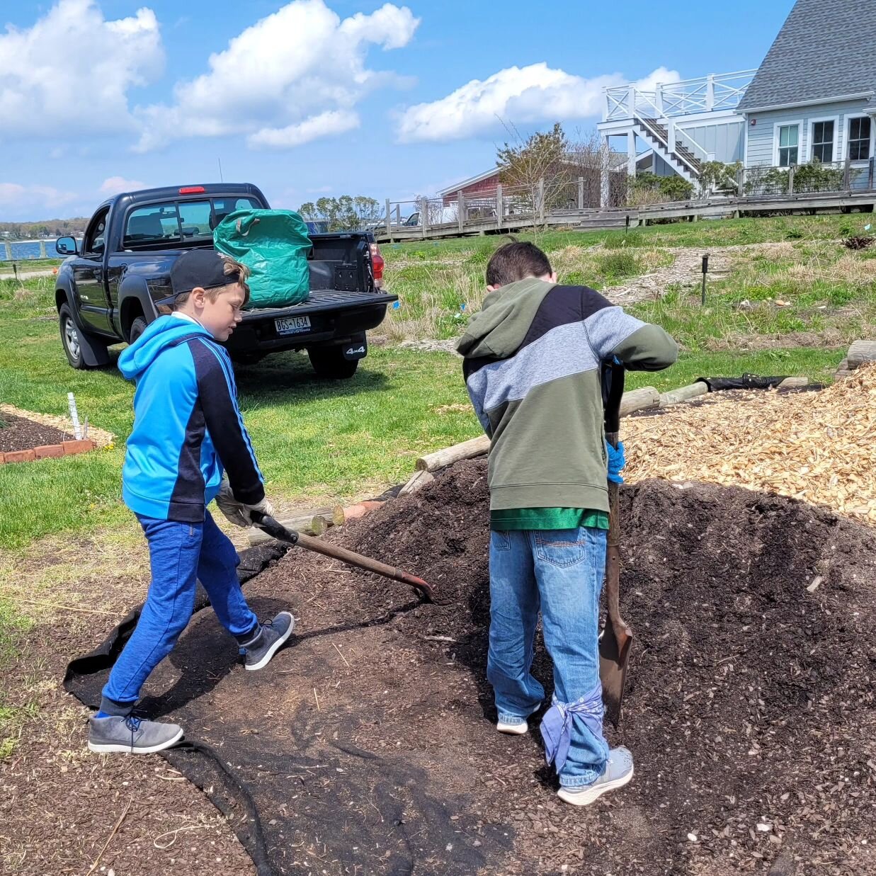 This afternoon, the students did some community service helping out at the community garden. I don't know who had more fun in the sun and the dirt! #community #communityservice #learningoutside #giveback