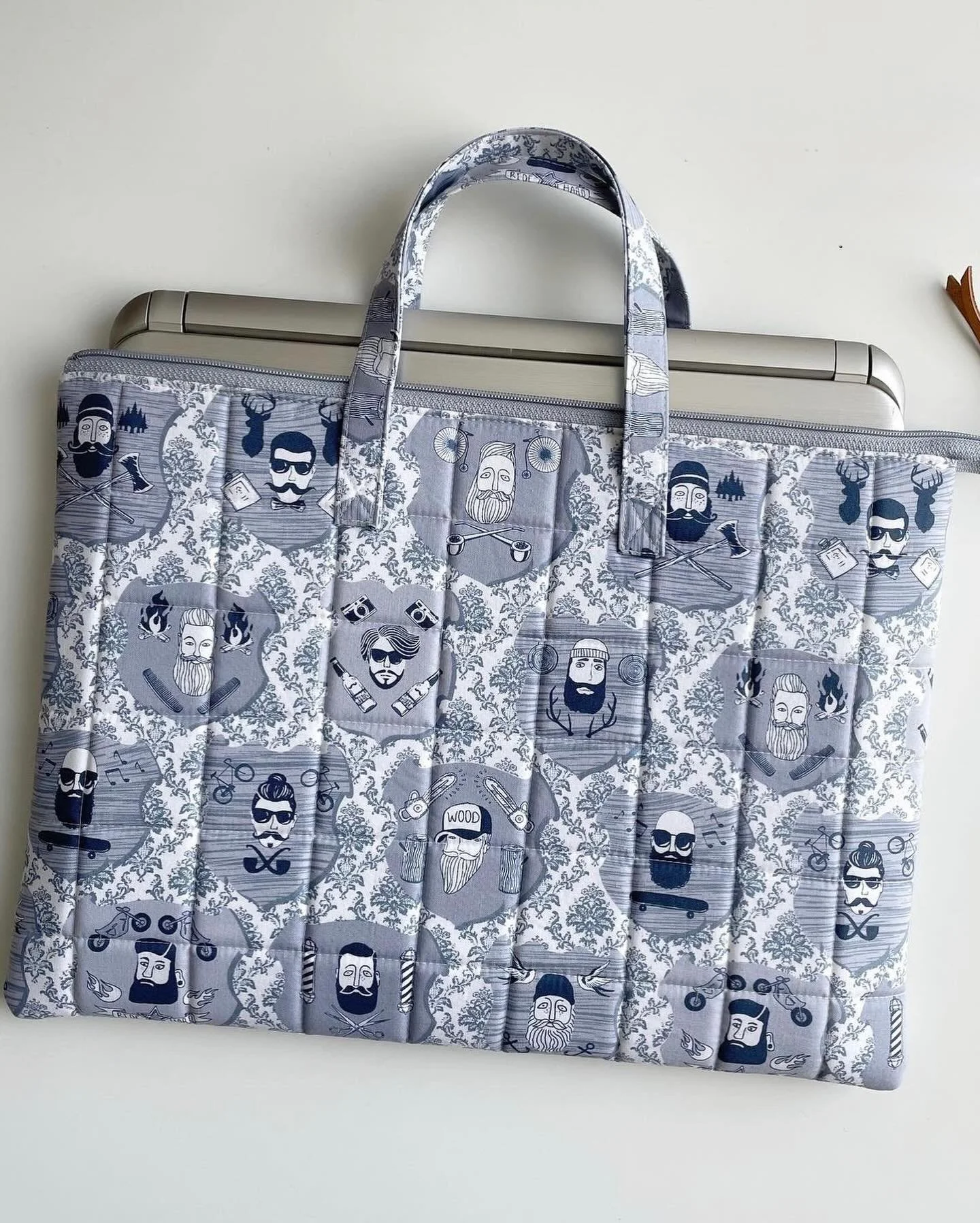 One of the things I love about sewing is being able to create useful projects I get to use on a daily basis. 

My PRESTON LAPTOP CASE is a perfect example. This pattern provides instructions on how to make these handy cases in FOUR SIZES. It also inc