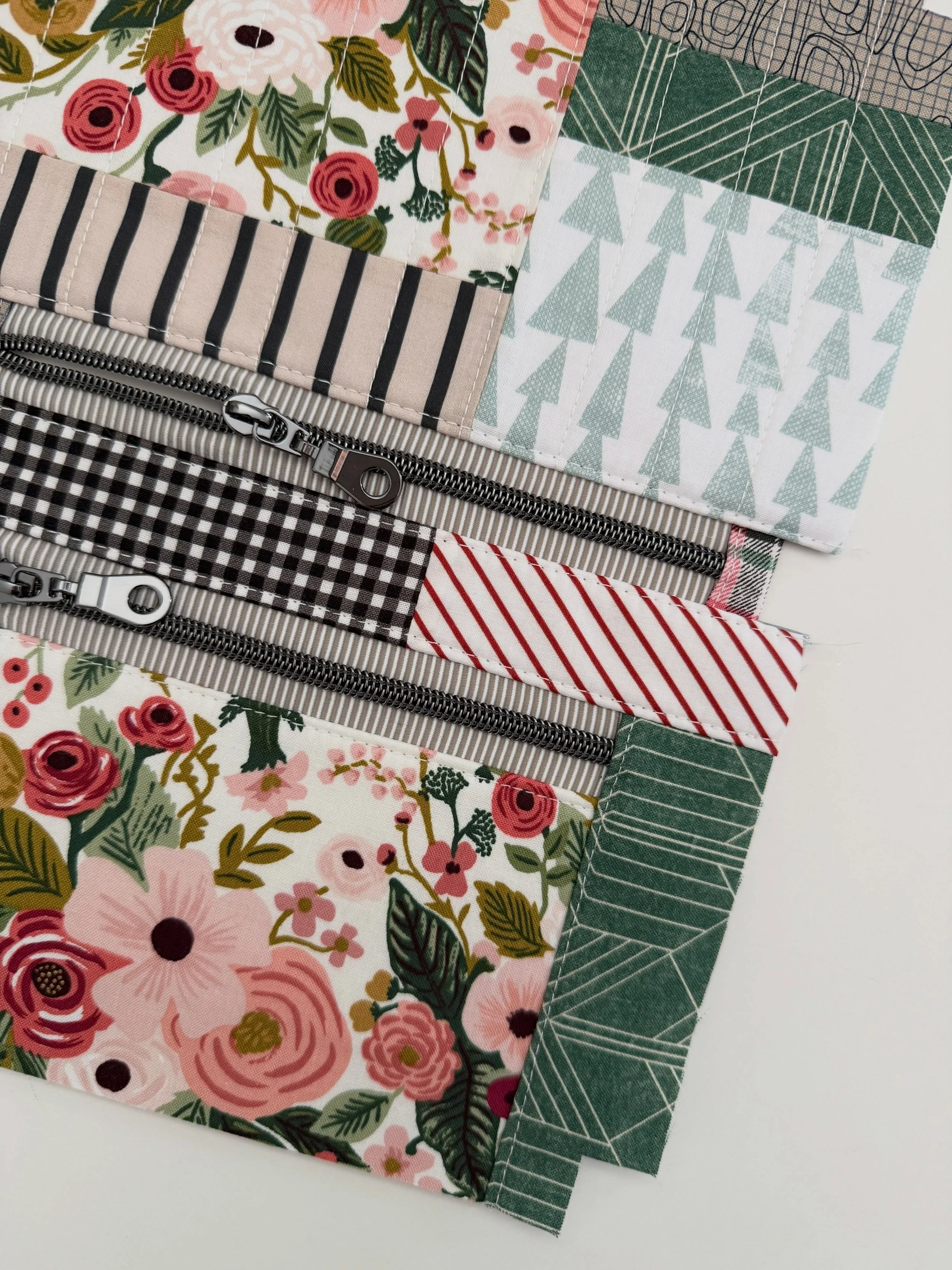 I tried something new and decided to turn some of my favorite scraps of fabric into a Devon Pouch. What do you think? Turned out pretty well, didn&rsquo;t she?

I made a large size of the pouch and combined the scrappy quilting cotton with my favorit