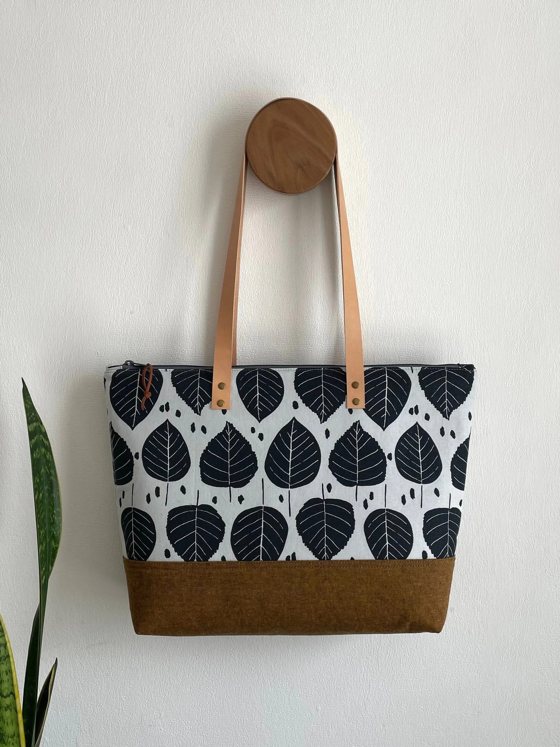 Roomy, stylish, and practical, the Ashford Handbag makes a wonderful work companion with plenty of space for your laptop, daily essentials, and a little extra room for those things you inevitably pick up throughout the day. 🤎

The bag measures appro