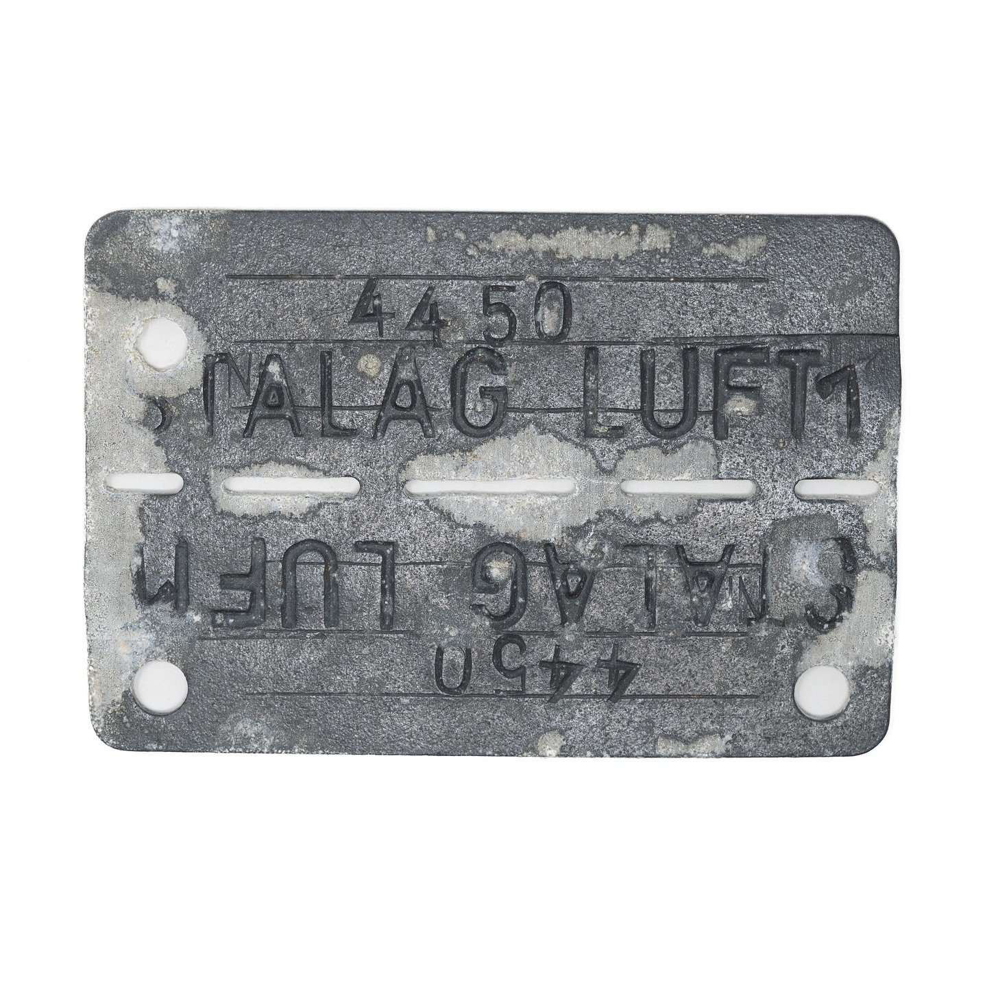 POW dogtag issued by the Germans to Lt. Edward J. Quigley, who served in the 392nd BG, 8th AAF. On April 8, 1944, Quigley&rsquo;s B-24 was shot down by fighters while flying a mission to bomb an airbase outside of Brunswick, Germany. He spent 11 mont