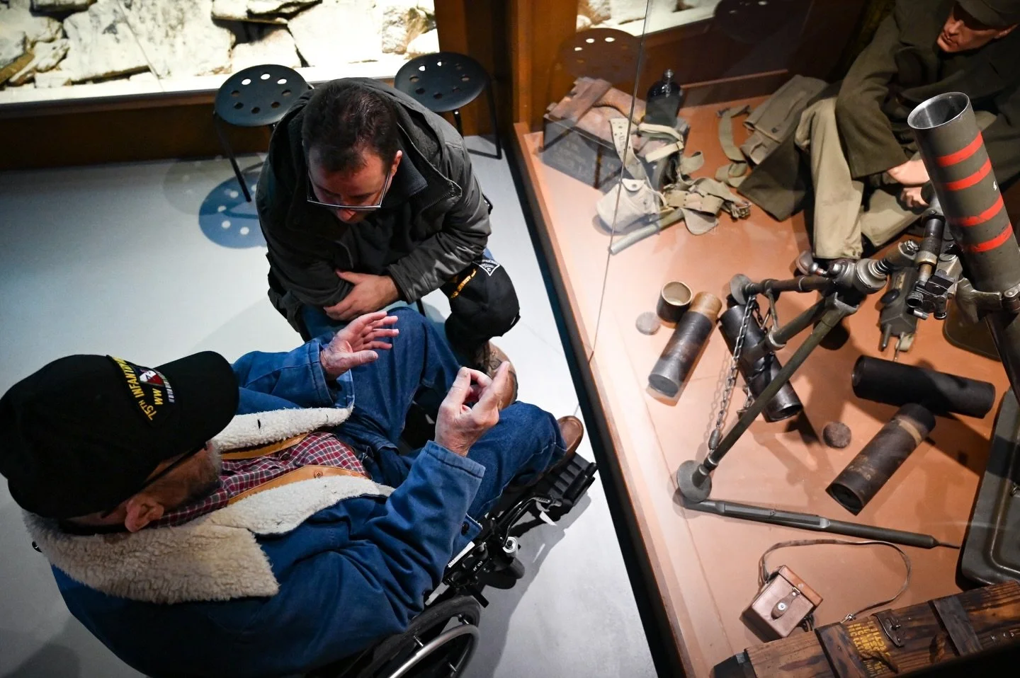 World War II veteran Joseph Watson, who commanded an 81mm mortar platoon in Company D, 291st Infantry Regiment, 75th Infantry Division, reflects with battlefield tour guide Bob Konings beside the same type of weapon he used in combat. During commemor