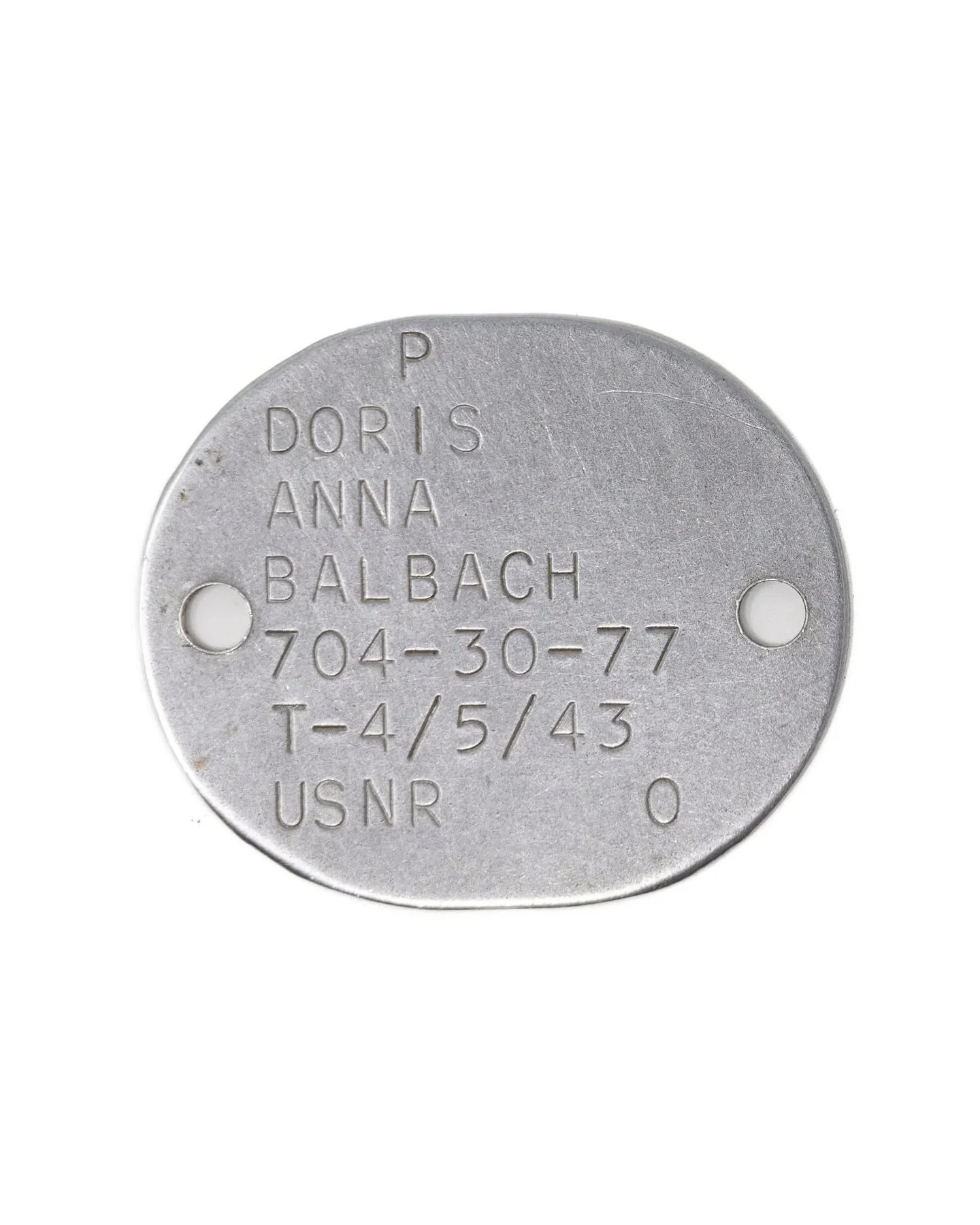 Doris Anna Balbach served in the U.S. Navy WAVES (Women Accepted for Volunteer Emergency Service) during World War II, attaining the rank of Storekeeper, Third Class (SK3c). She was part of the first graduating class of WAVES storekeepers in naval hi