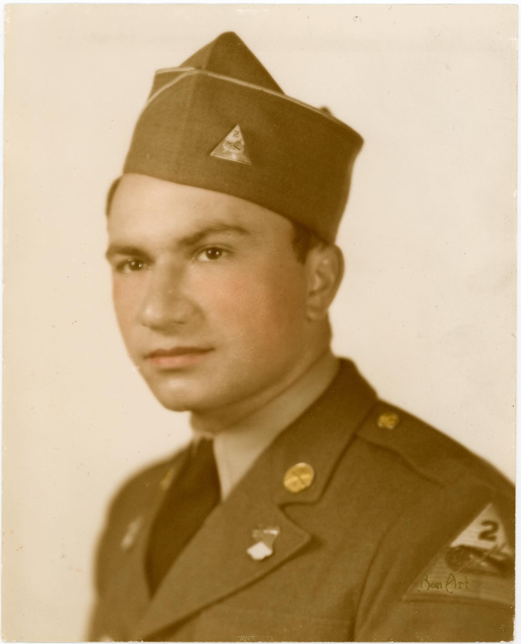 The WWII Veterans History Project recently acquired a collection of artifacts from the daughter of Sergeant John J. Arnone, who served in H Company, 66th Armored Regiment, 2nd Armored Division. The collection includes his original dog tags, Purple He