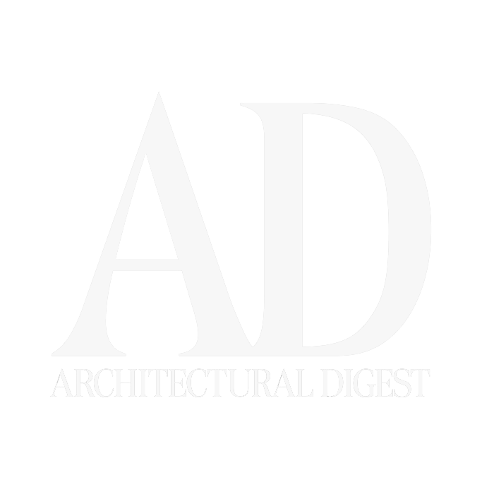 Logo for Architectural Digest featuring large white letters 'A' and 'D' on a black background with the words 'ARCHITECTURAL DIGEST' in smaller white letters underneath.