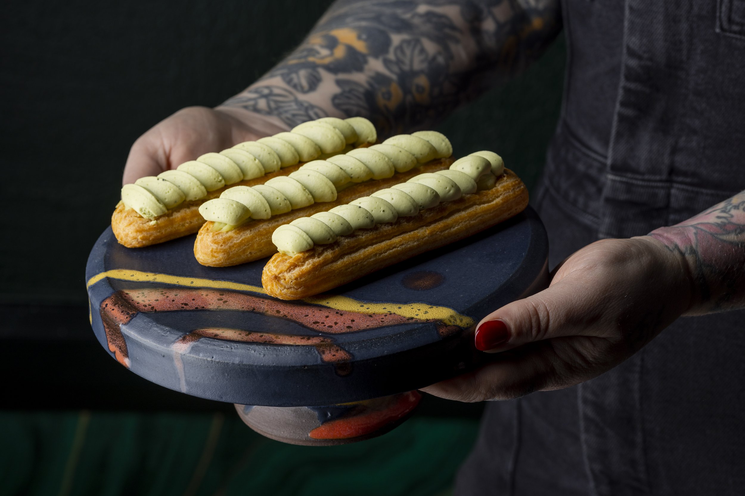 Midnight Campfire cake stand with eclairs