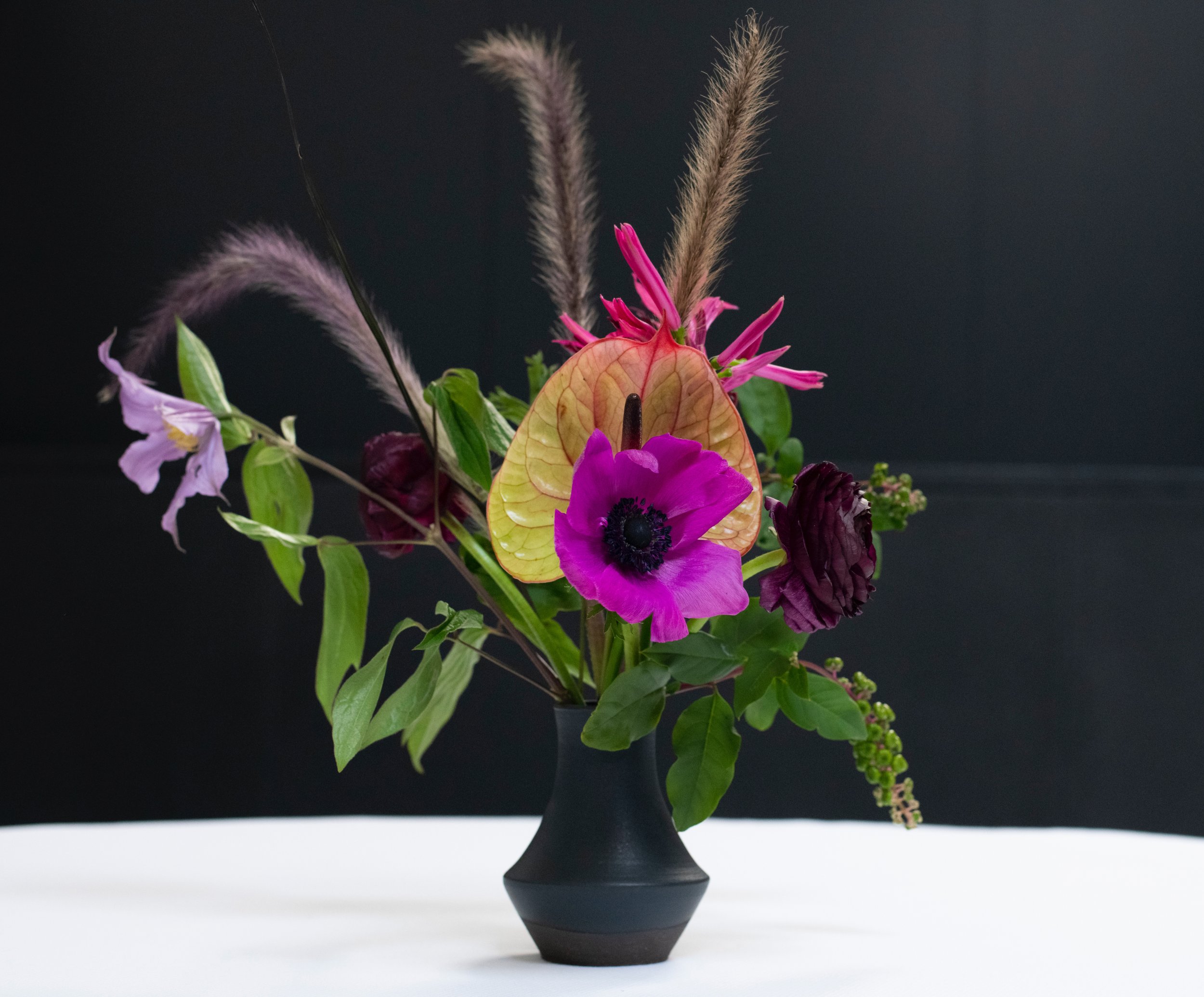 single black vase with bouquet