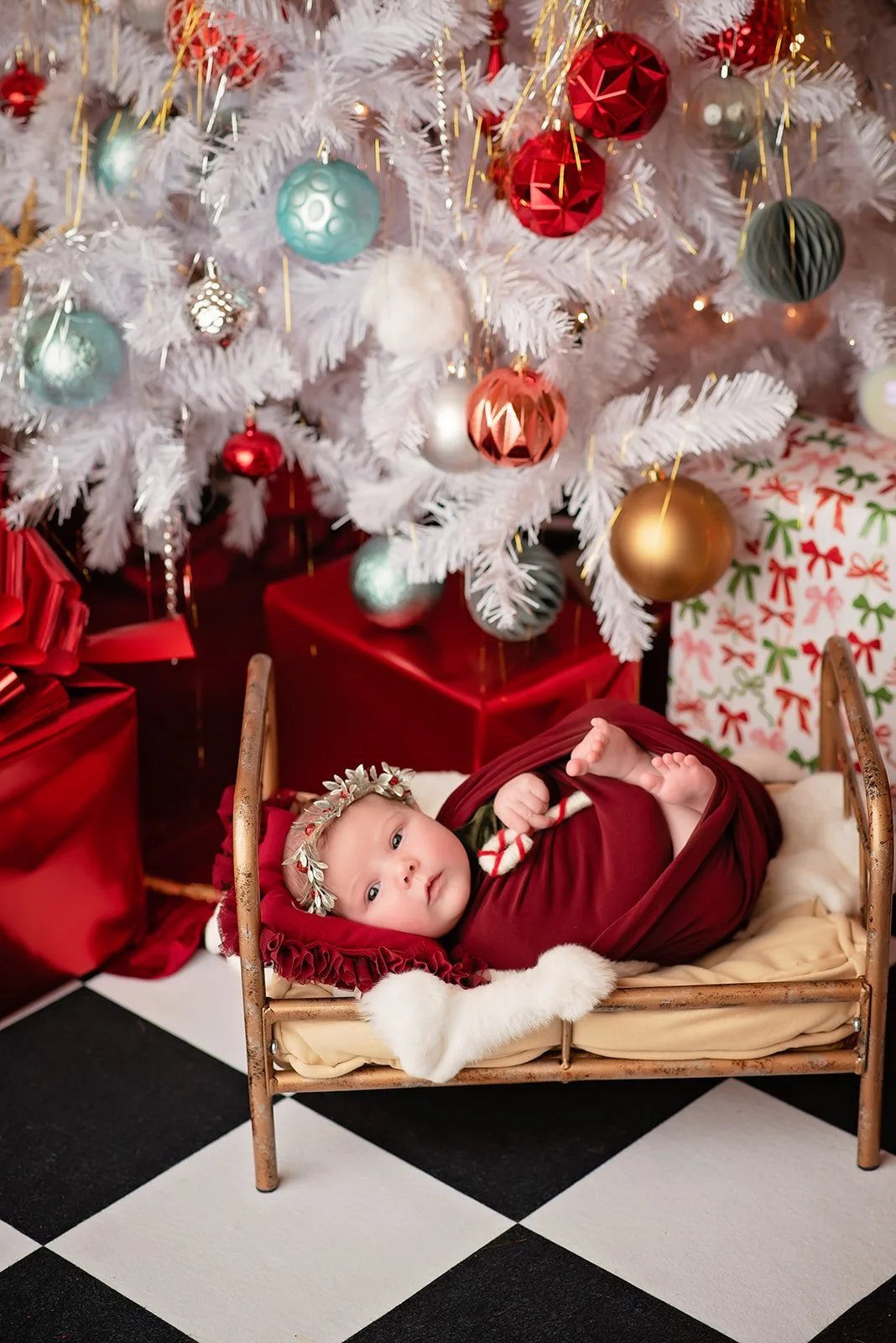 Christmas themed newborn baby photo shoot from studio near Waxhaw, NC