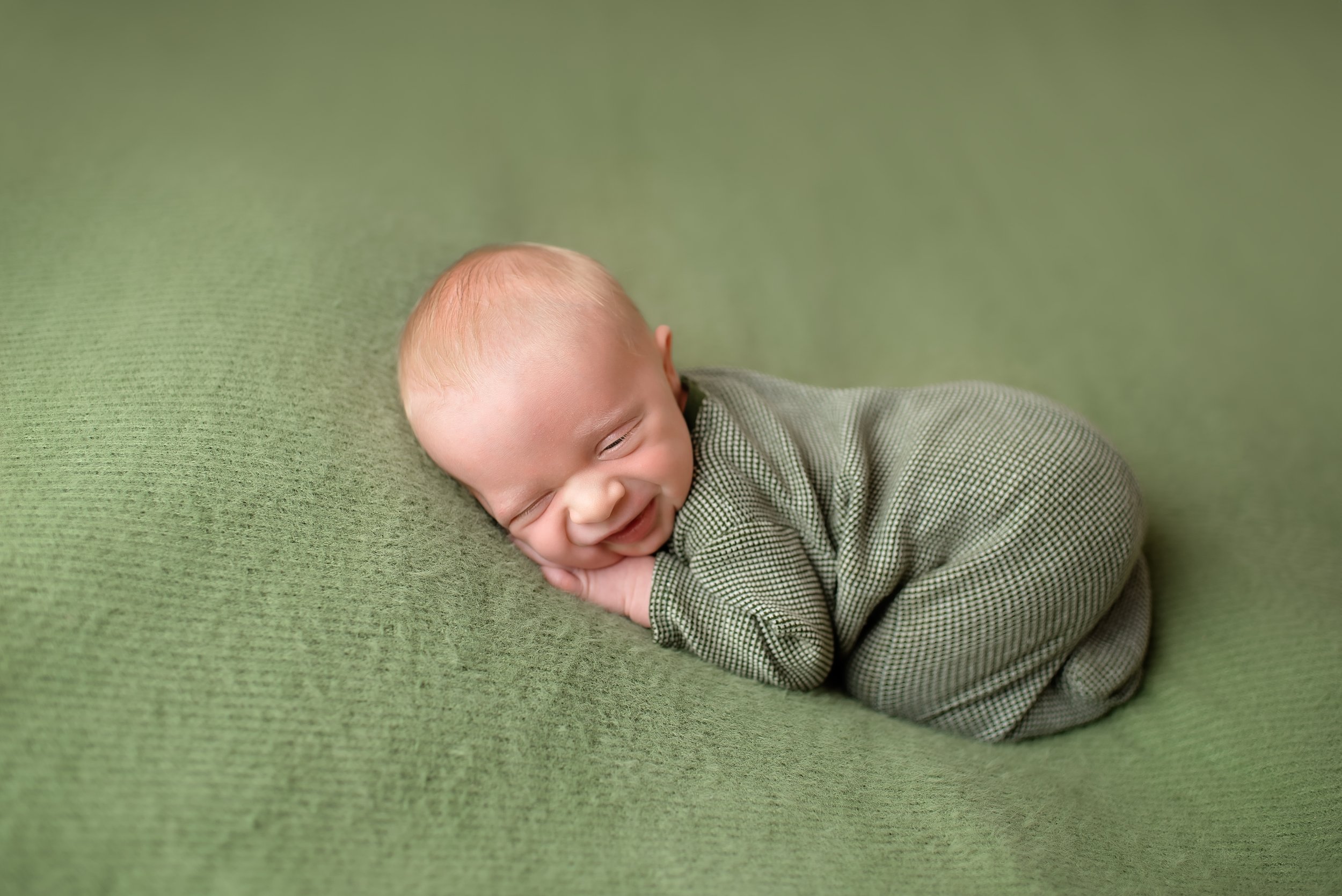 newborn baby boy in green photo session in monroe, nc