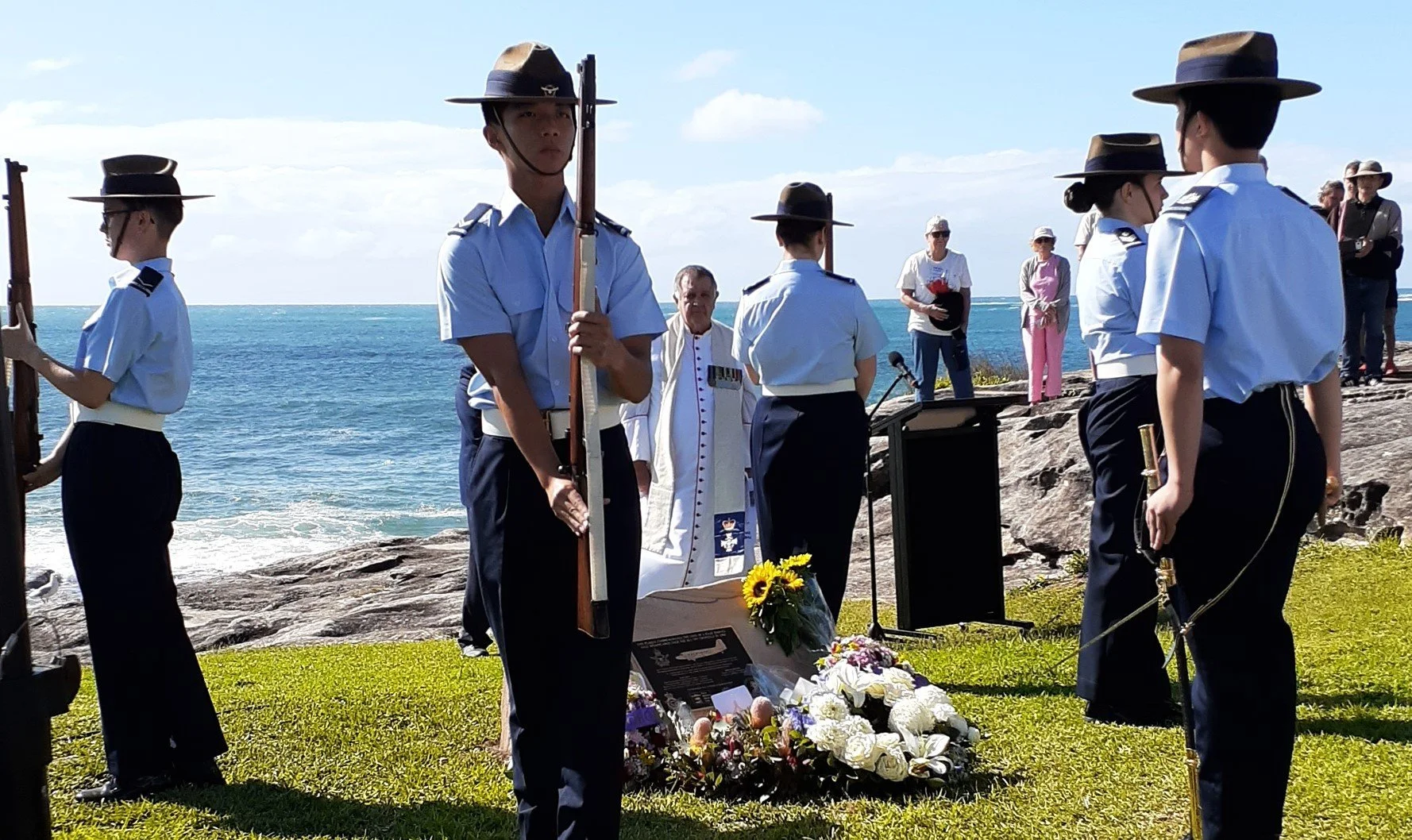  Air cadets and the floral tributes. 