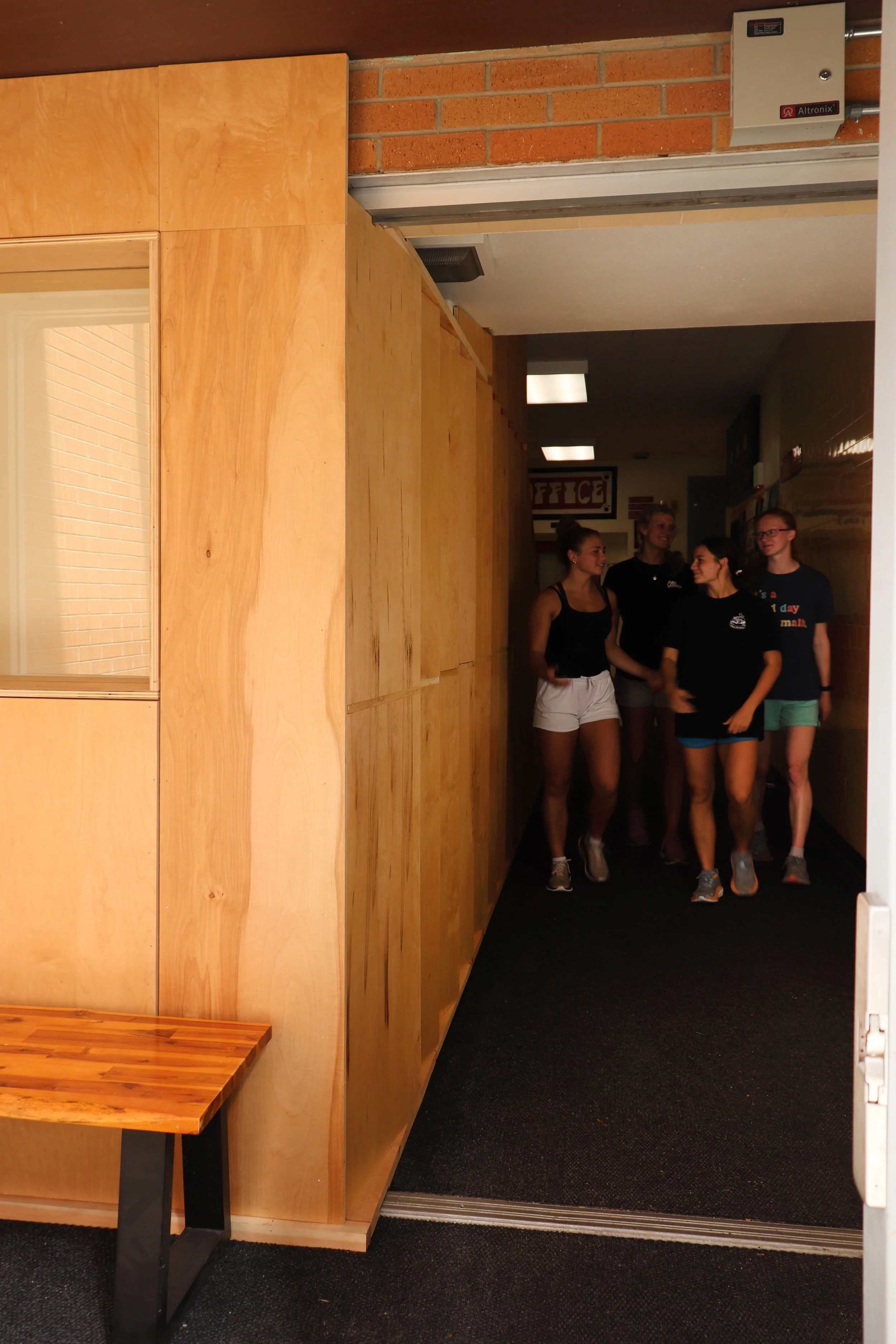 Entry wall girls walking.jpg