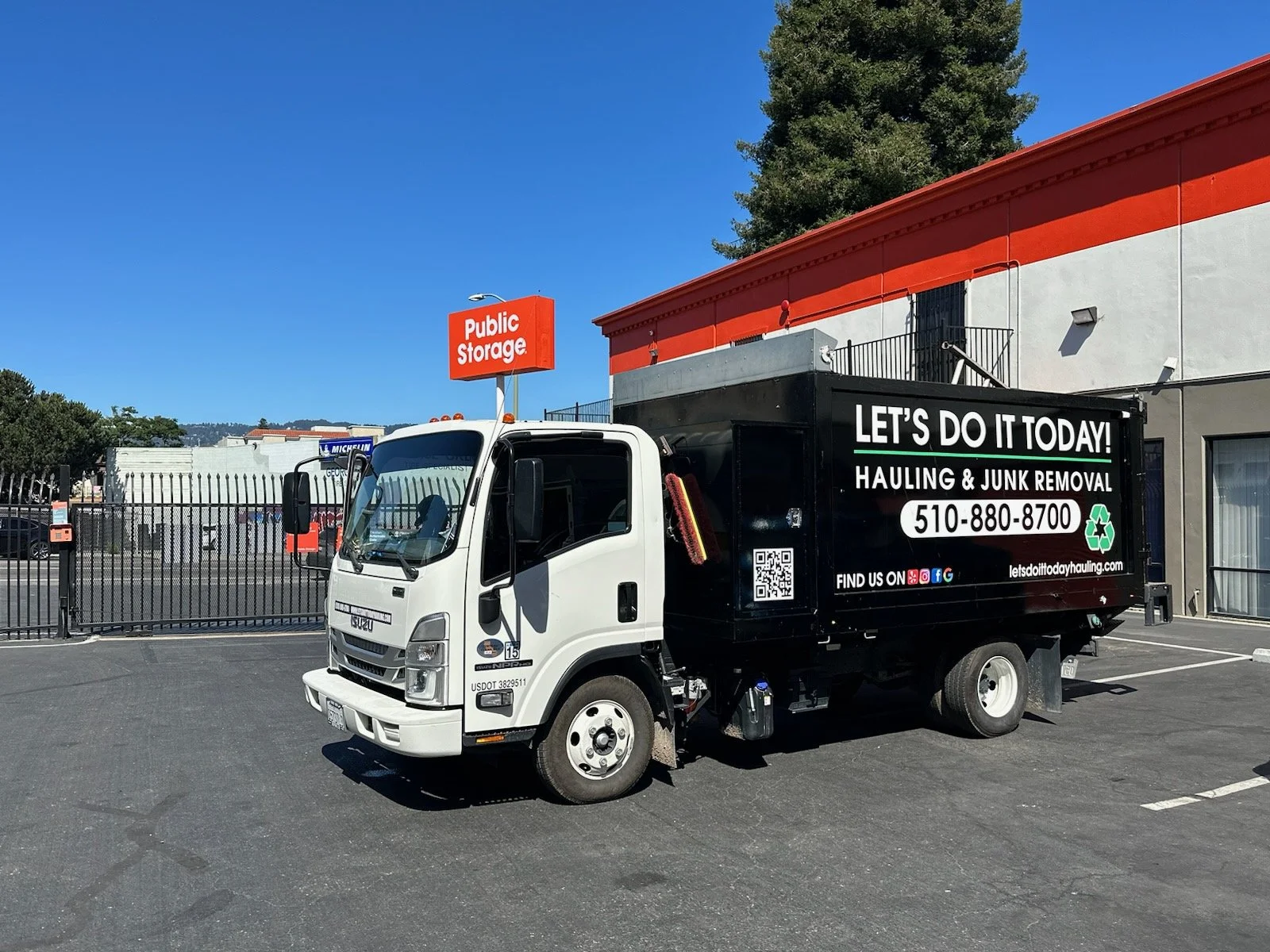 Let's Do It Today junk removal truck outside a Public Storage facility in the Bay Area