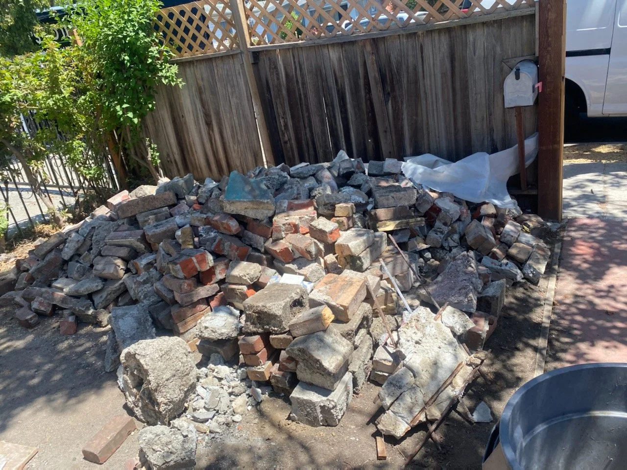 Pile of concrete and brick debris ready for removal and recycling