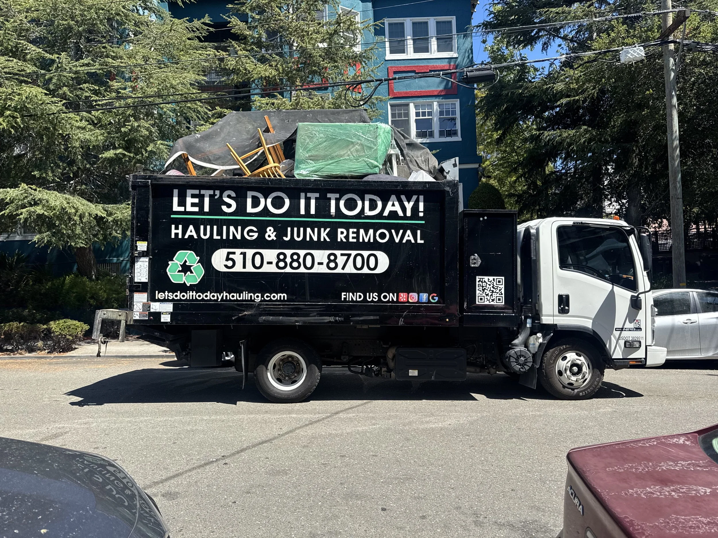 Let's Do It Today truck loaded during a property cleanout for a Bay Area landlord