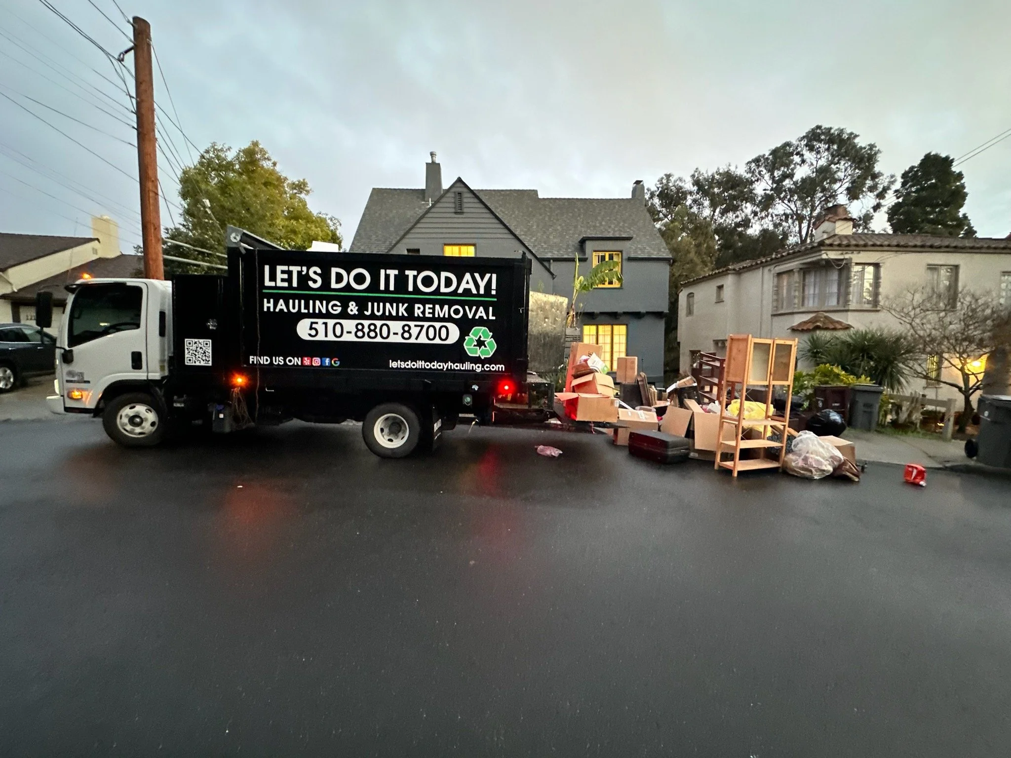 Let's Do It Today junk removal truck parked outside a Bay Area home for eco-friendly disposal