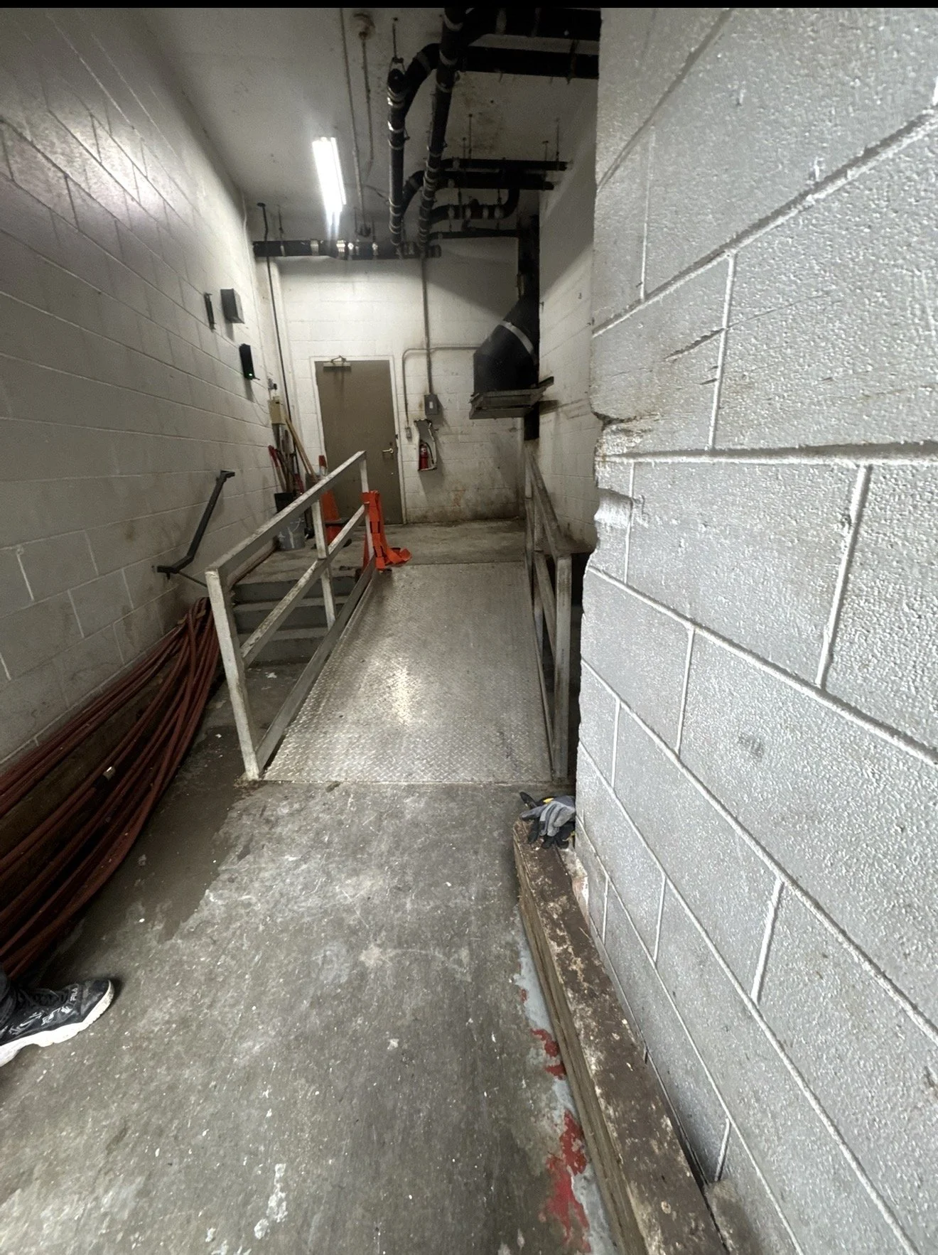 Clean basement corridor at a luxury apartment community after junk removal service