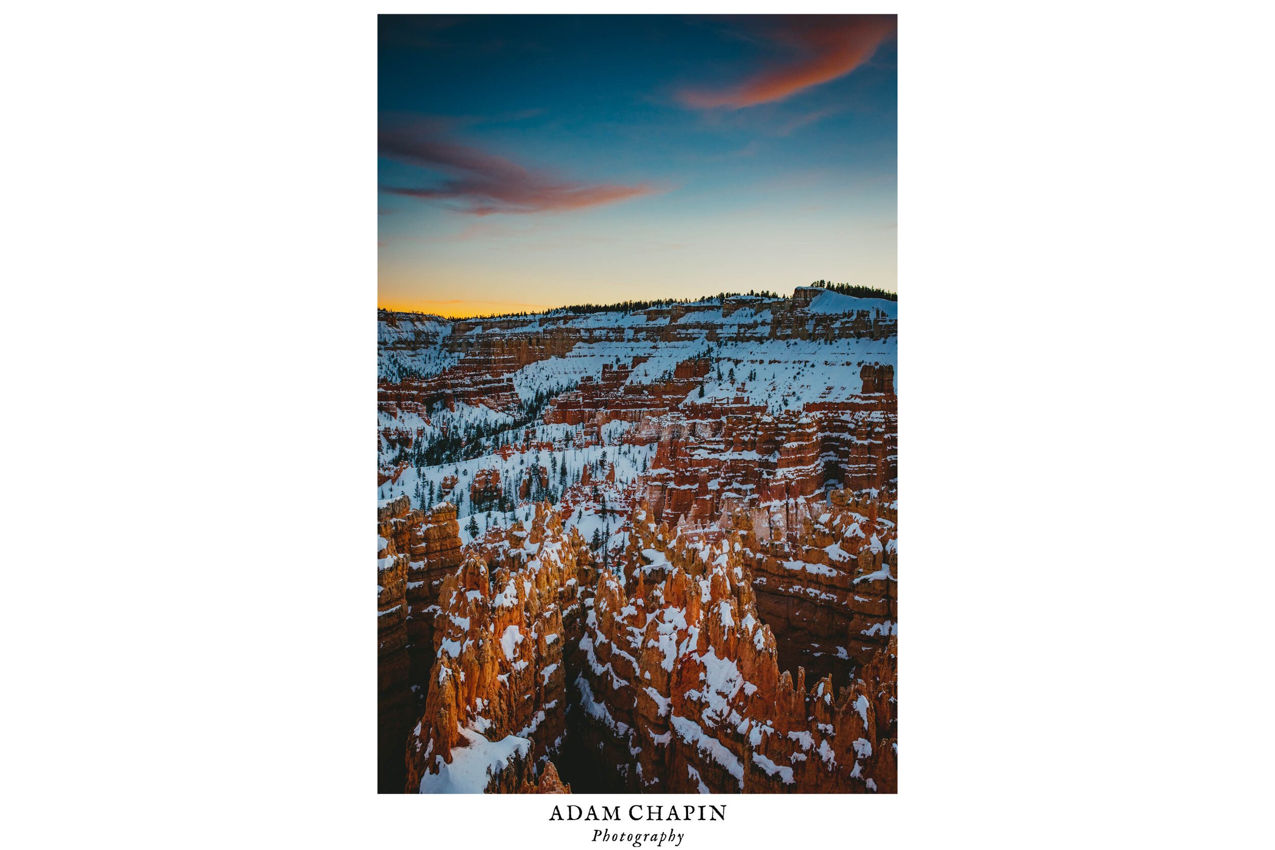 sunset over bryce canyon with snow covered hoodoos