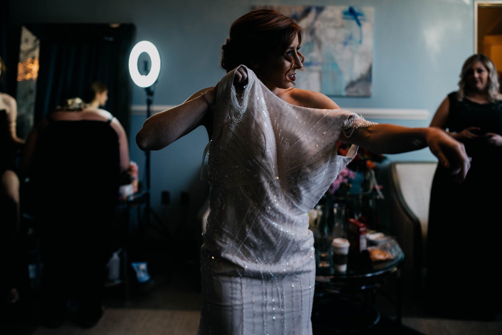 bride getting into her dress