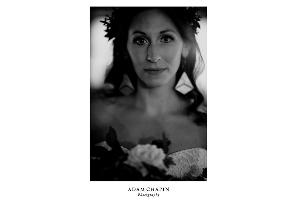 stoic portrait of the bride holding her bouquet just before the ceremony