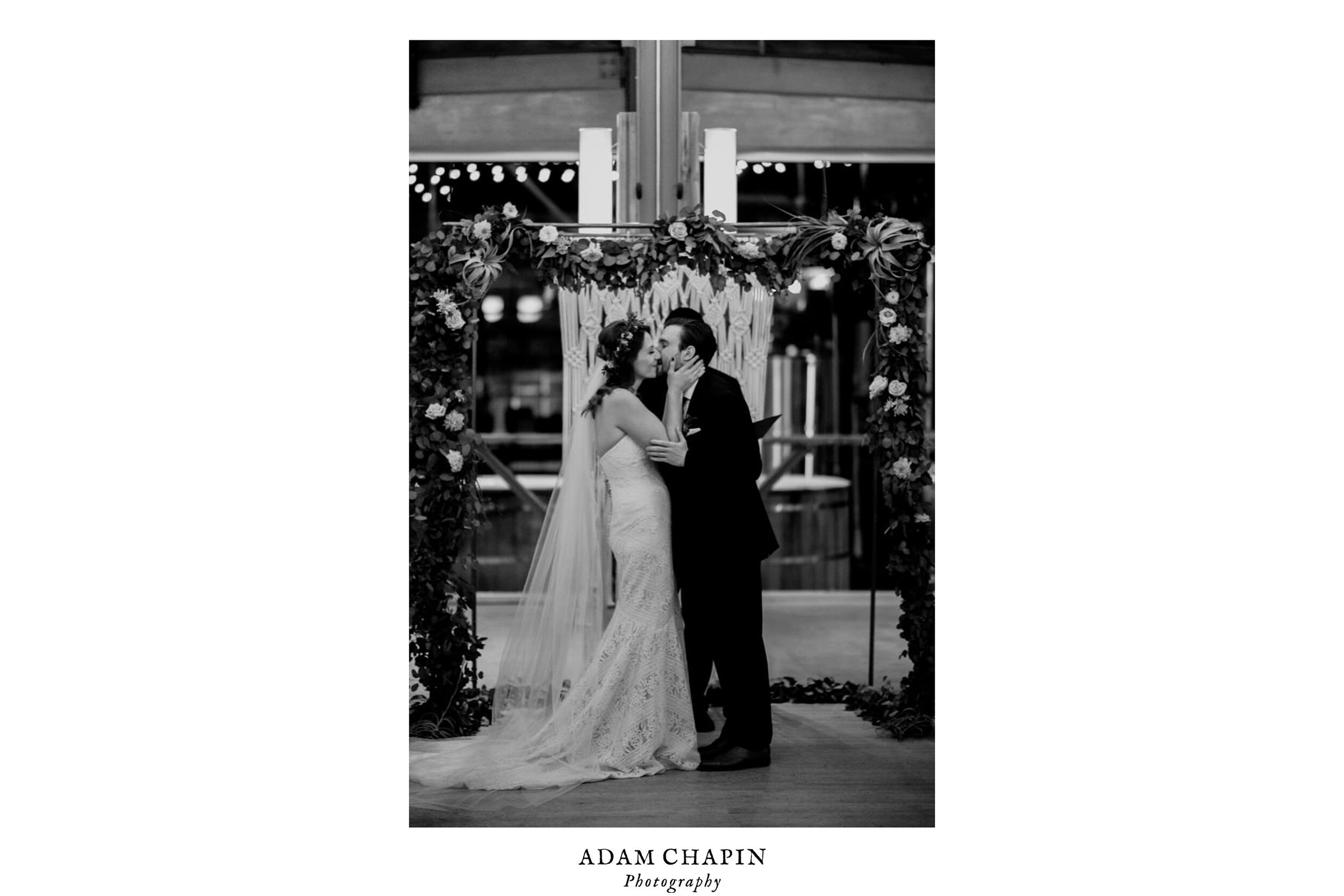 the bride and groom share the first kiss