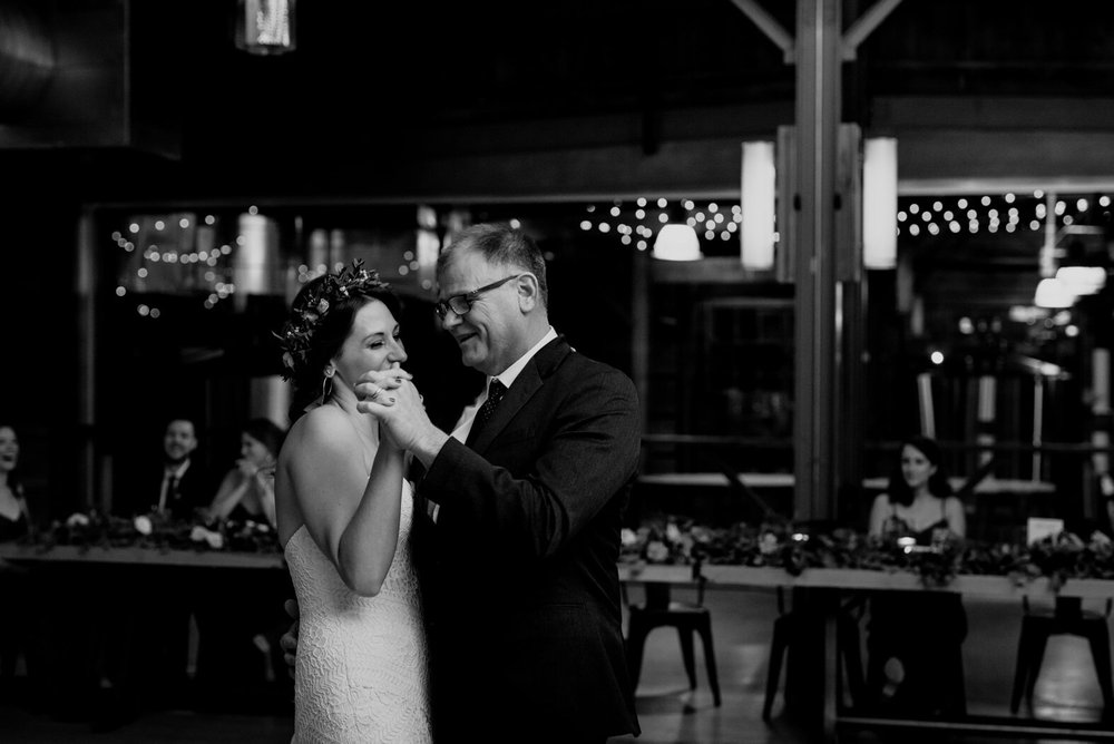 the bride and her father sharing in the father-daughter dance