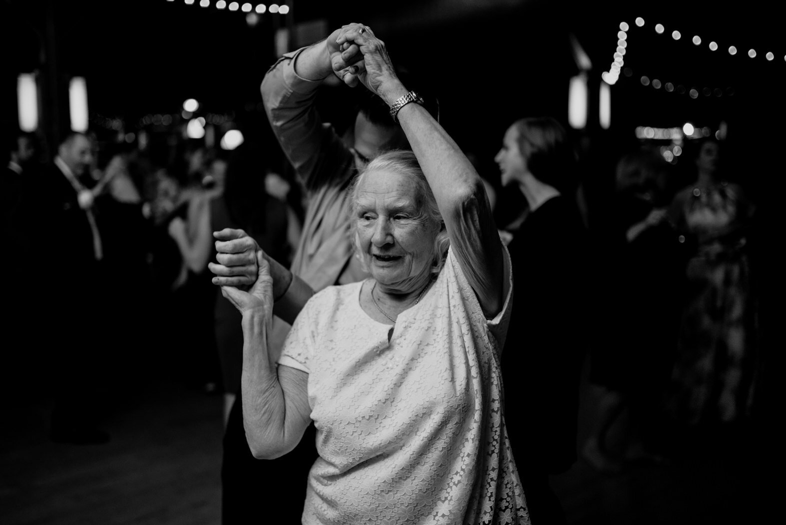 the brides grandmother dancing during the reception