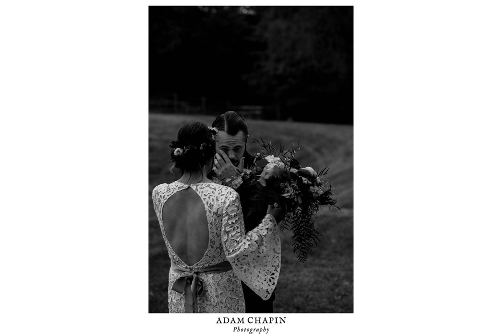 groom getting emotional during the first look with his bride