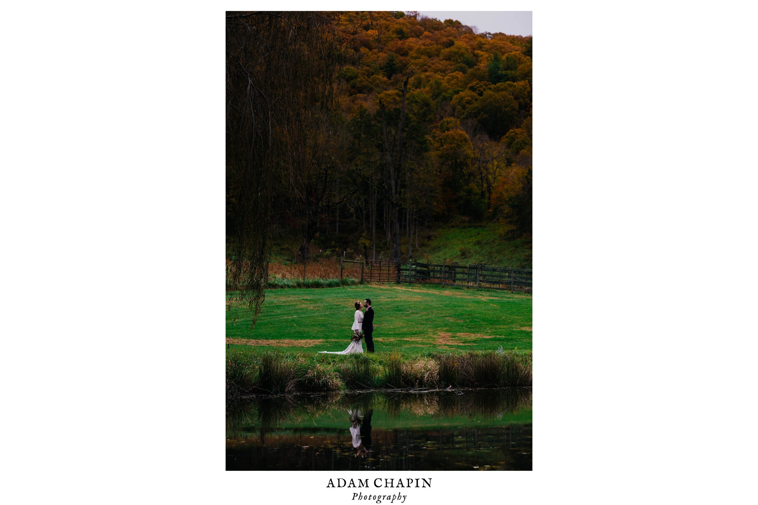 bride and groom at the edge of the lake during their first look