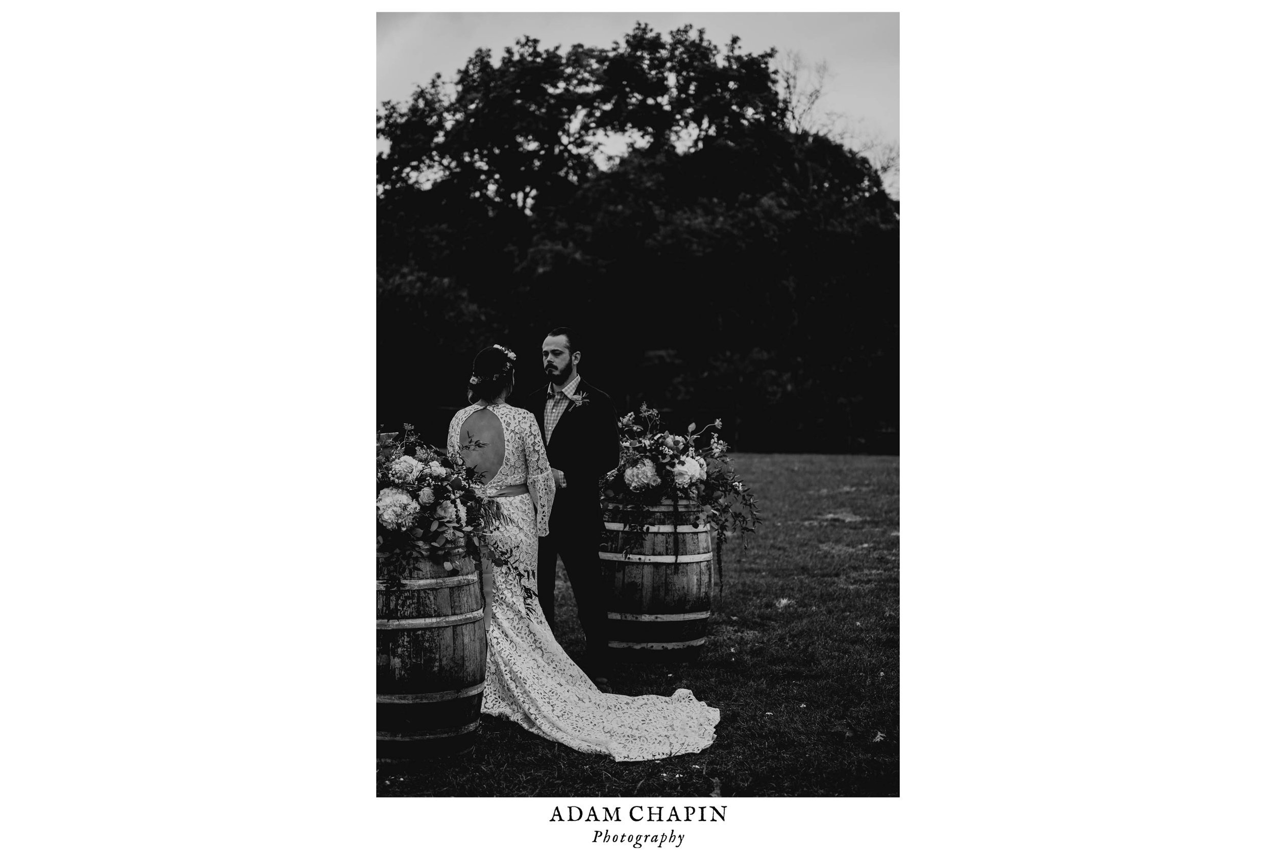 black and white photograph of the bride and groom during their ceremony