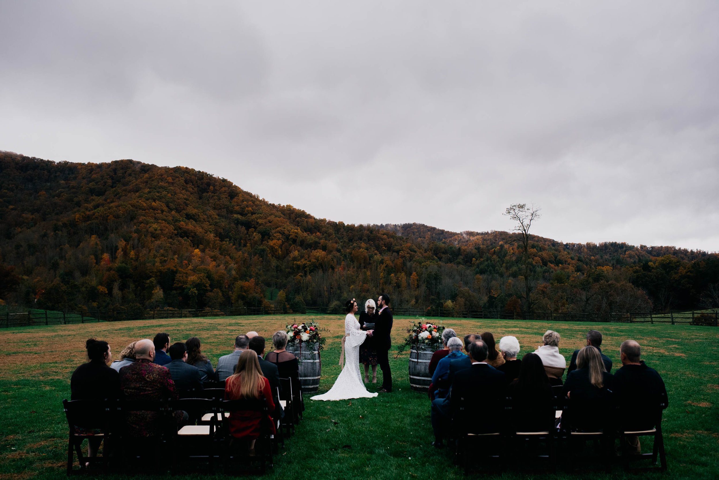 wide angle photograph of the wedding ceremony and venue during the ceremony