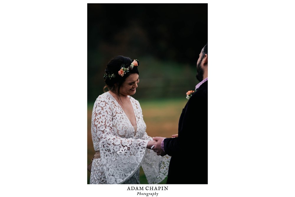 bride and groom laughing during the ring exchange