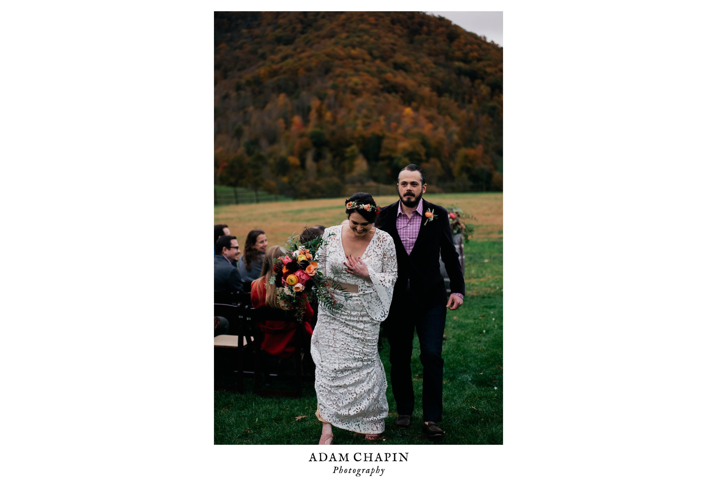 bride and groom walking during the recessional after their wedding