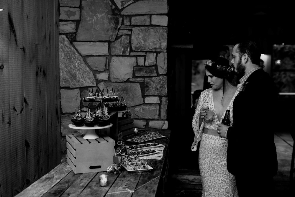 bride and groom spying their sweets before their reception