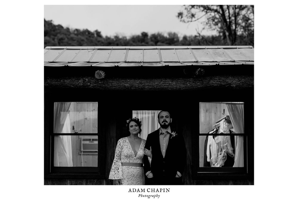 bride and groom standing under the awning of the bridal suite 