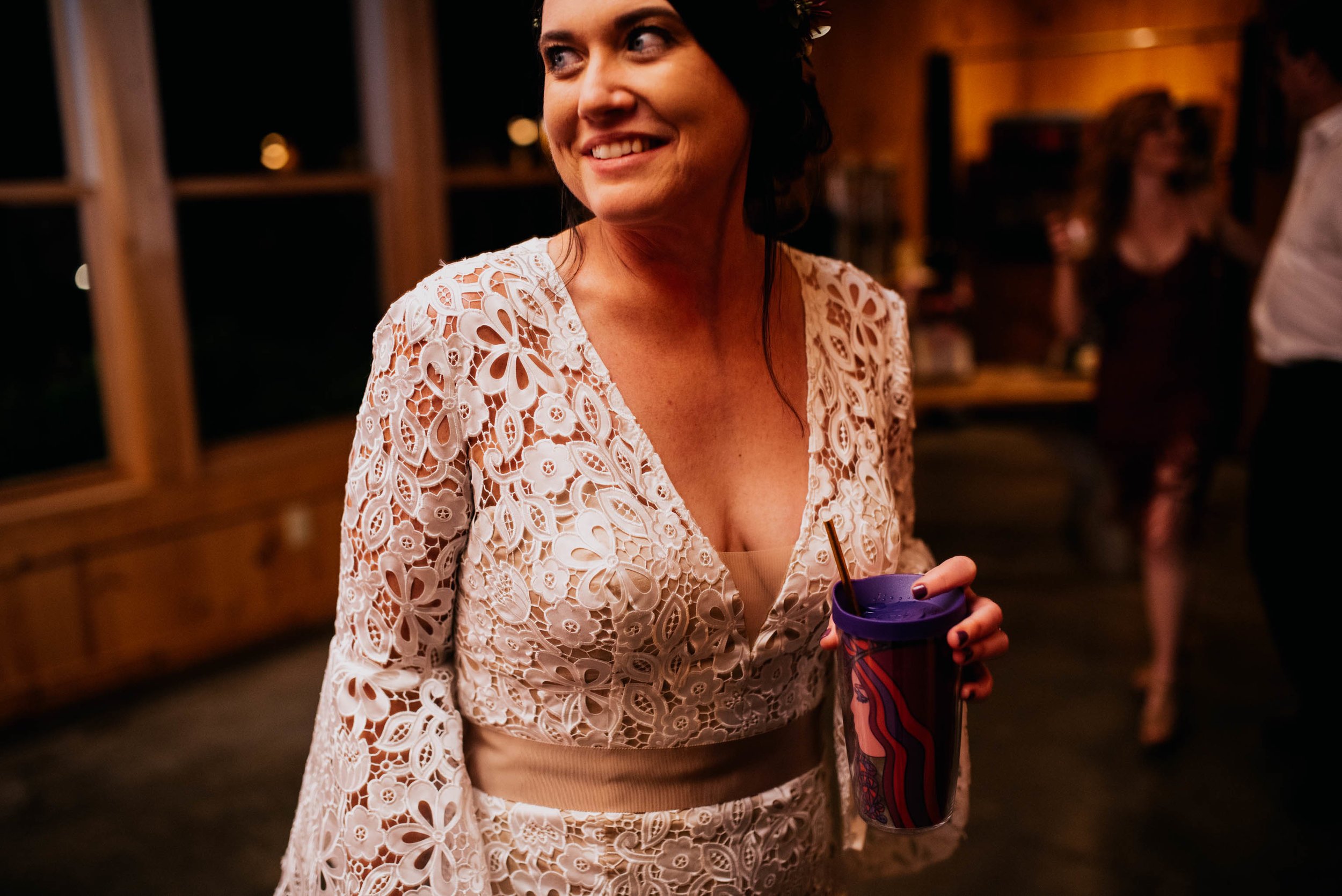 bride smiling during the reception while on the dancefloor