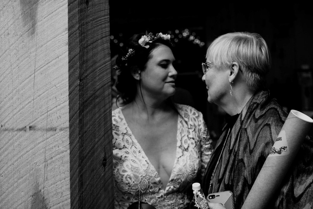 bride and groom's aunt having a conversation before the end of the night