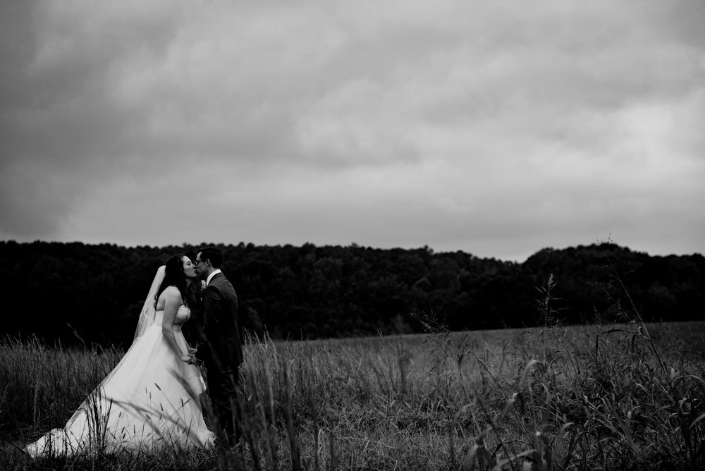 black and white photo of the bride and grooms first look
