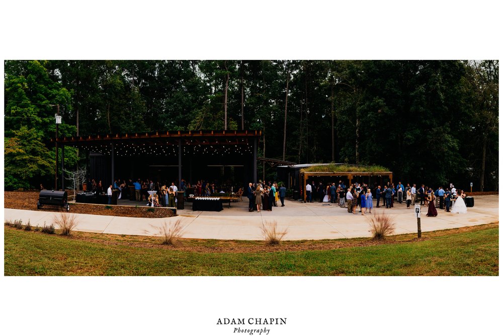 wide angle photo of the Meadows Raleigh reception space during the wedding