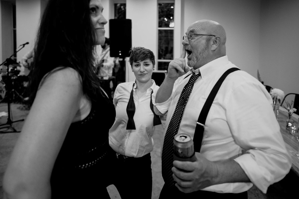 wedding guests dancing during the reception