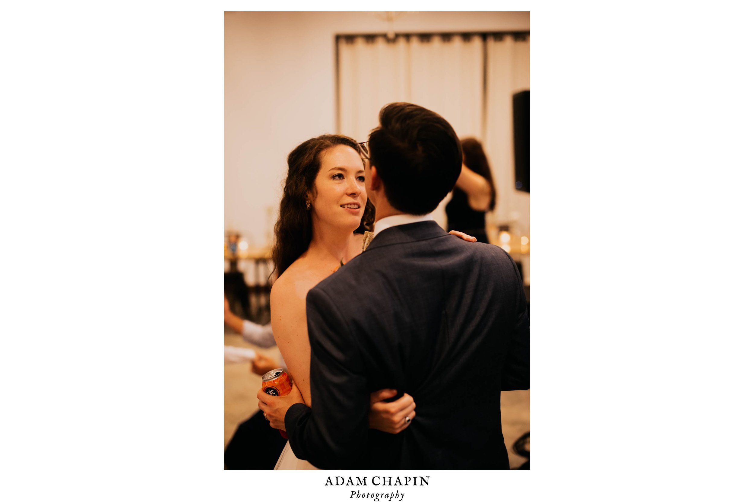 bride and groom sharing a dance together on the wedding evening