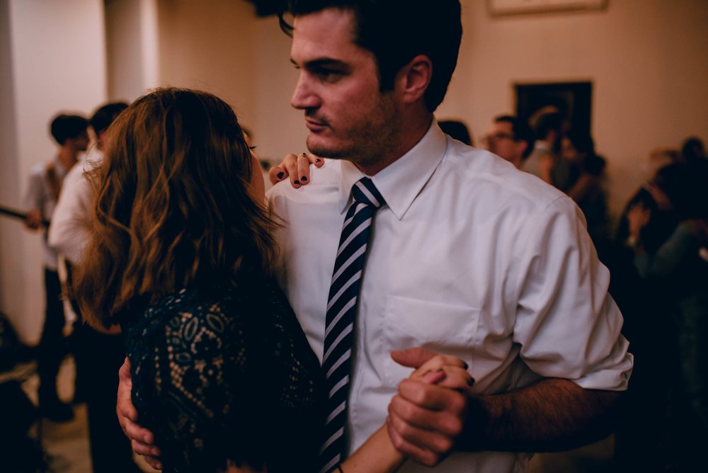 wedding guests slow dancing during wedding reception