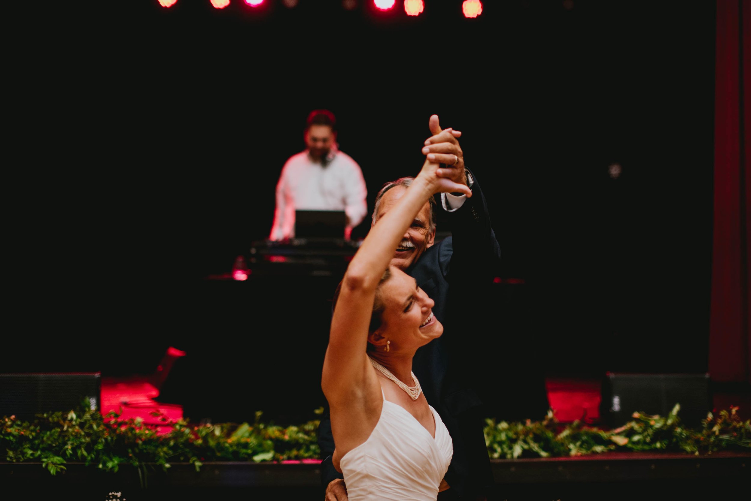 bride sharing a first dance with her father during the wedding reception at haw river ballroom