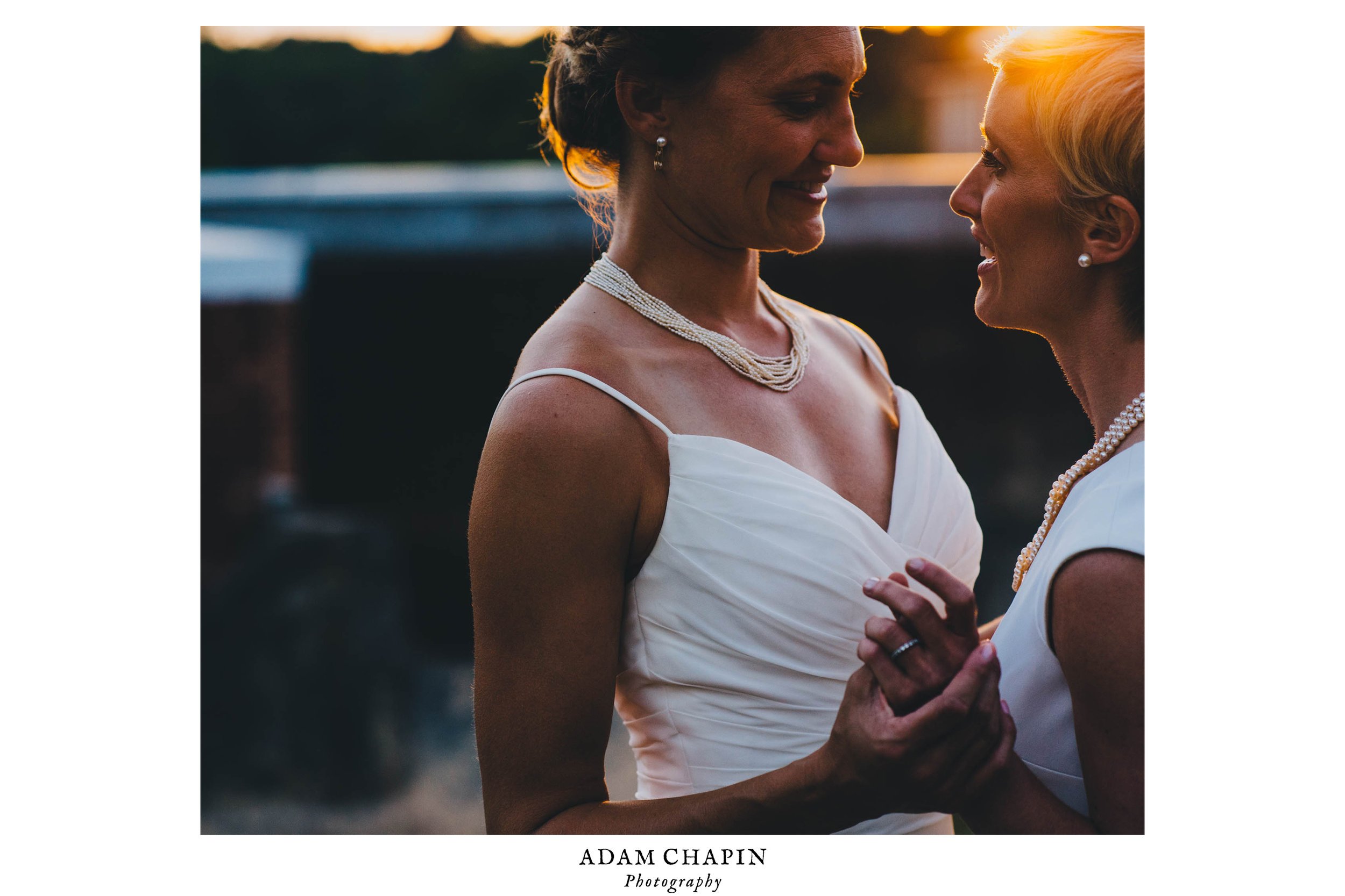 brides basked in the sunset over the haw river ballroom in saxapahaw north carolina