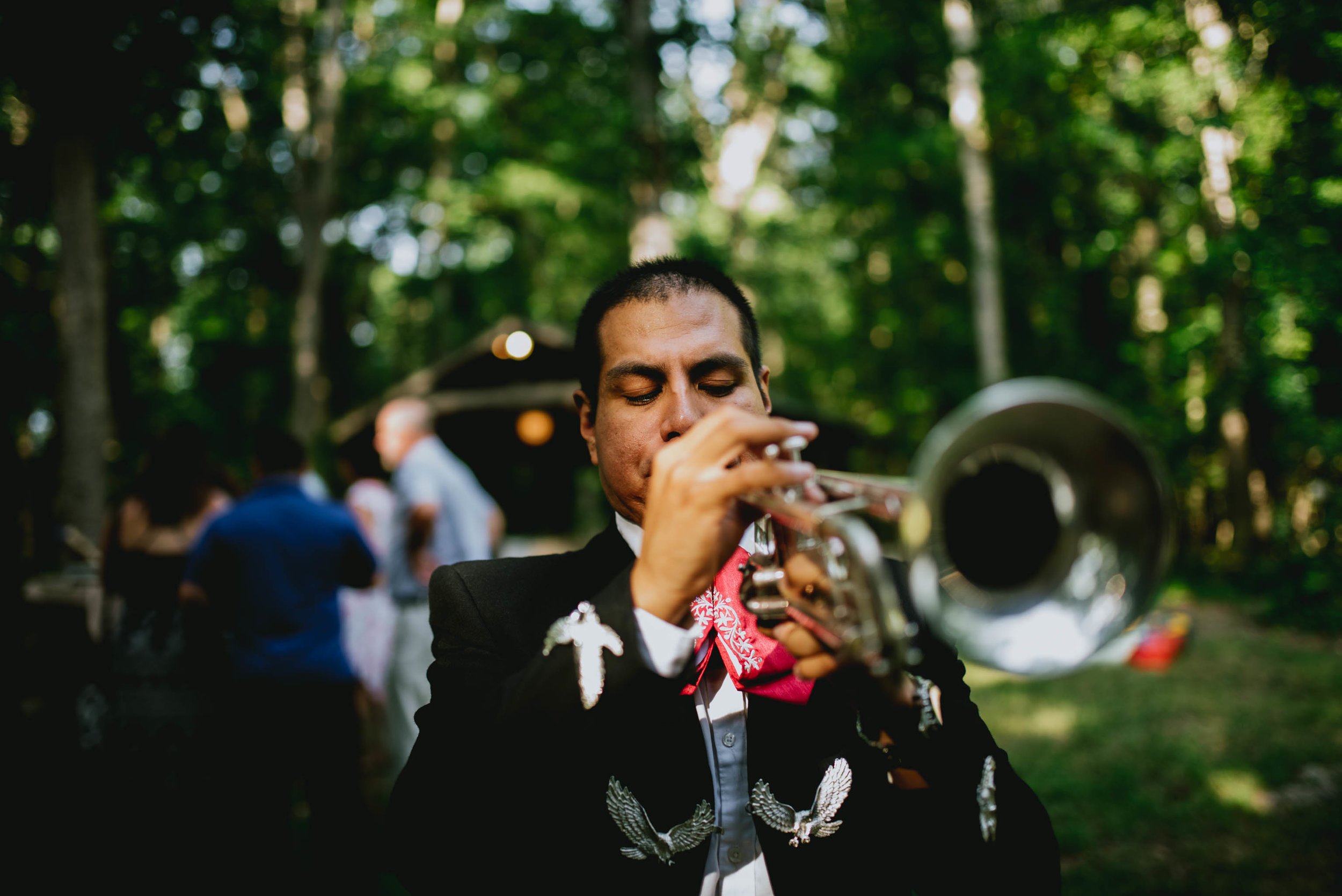 mariachi trumpeter after wedding ceremony at duke forest