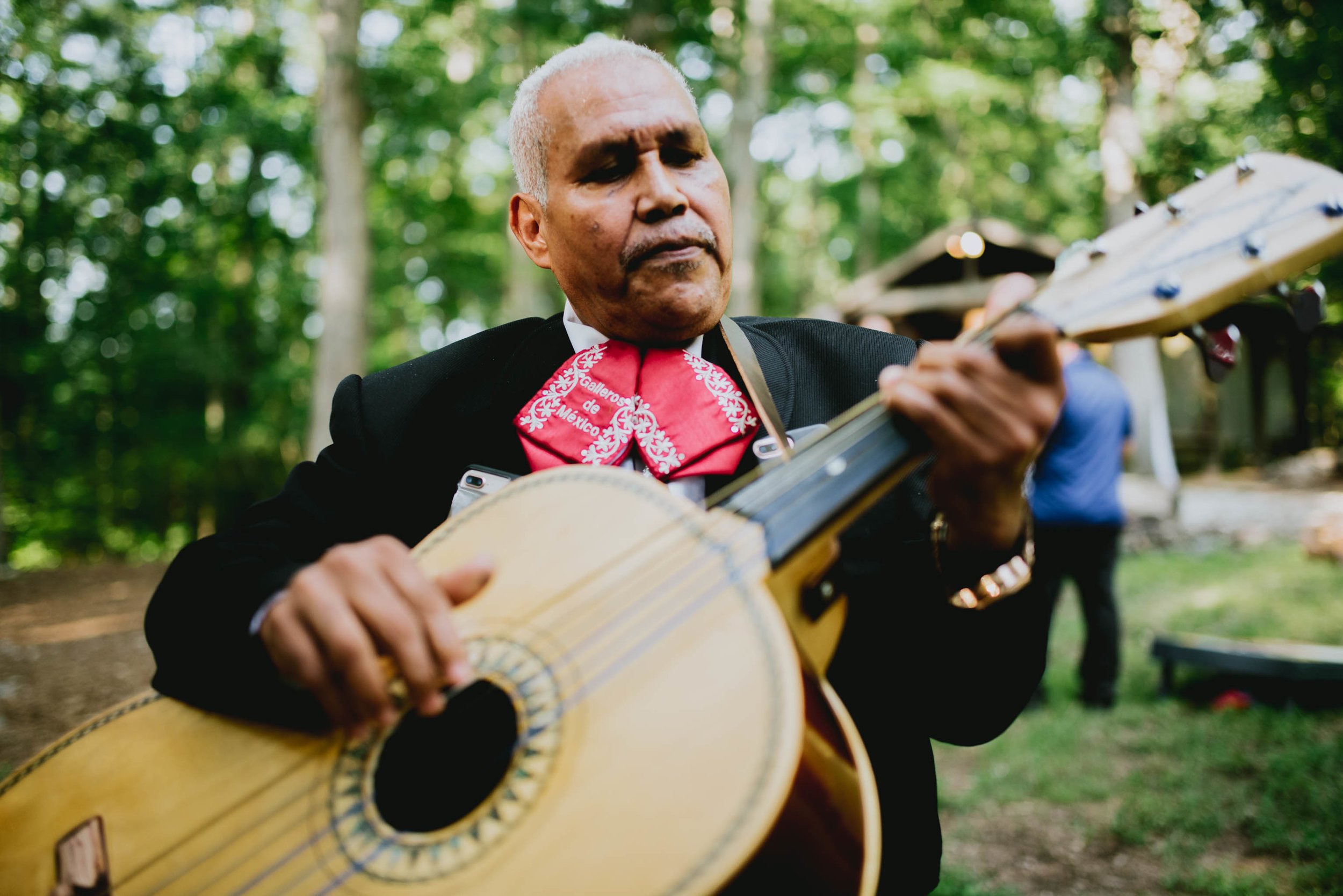 mariachi playing the guitarron