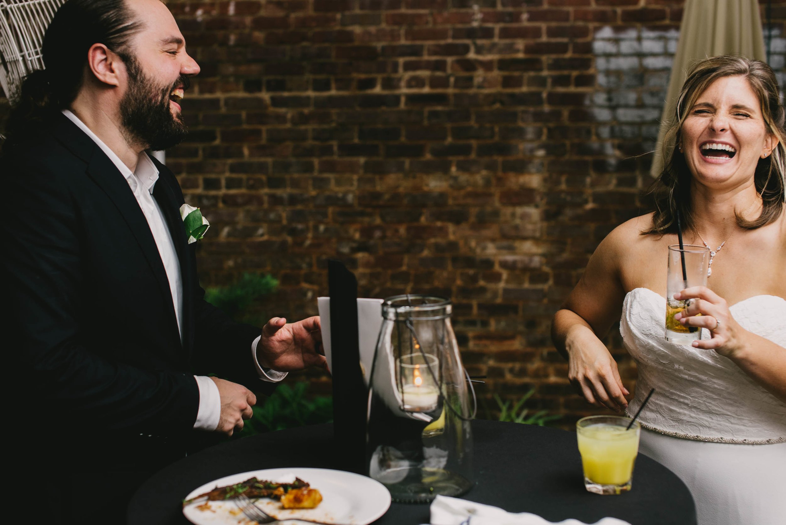 bride and groom laughing during their Jiddi Space and Courtyard Wedding at Sitti Restaurant